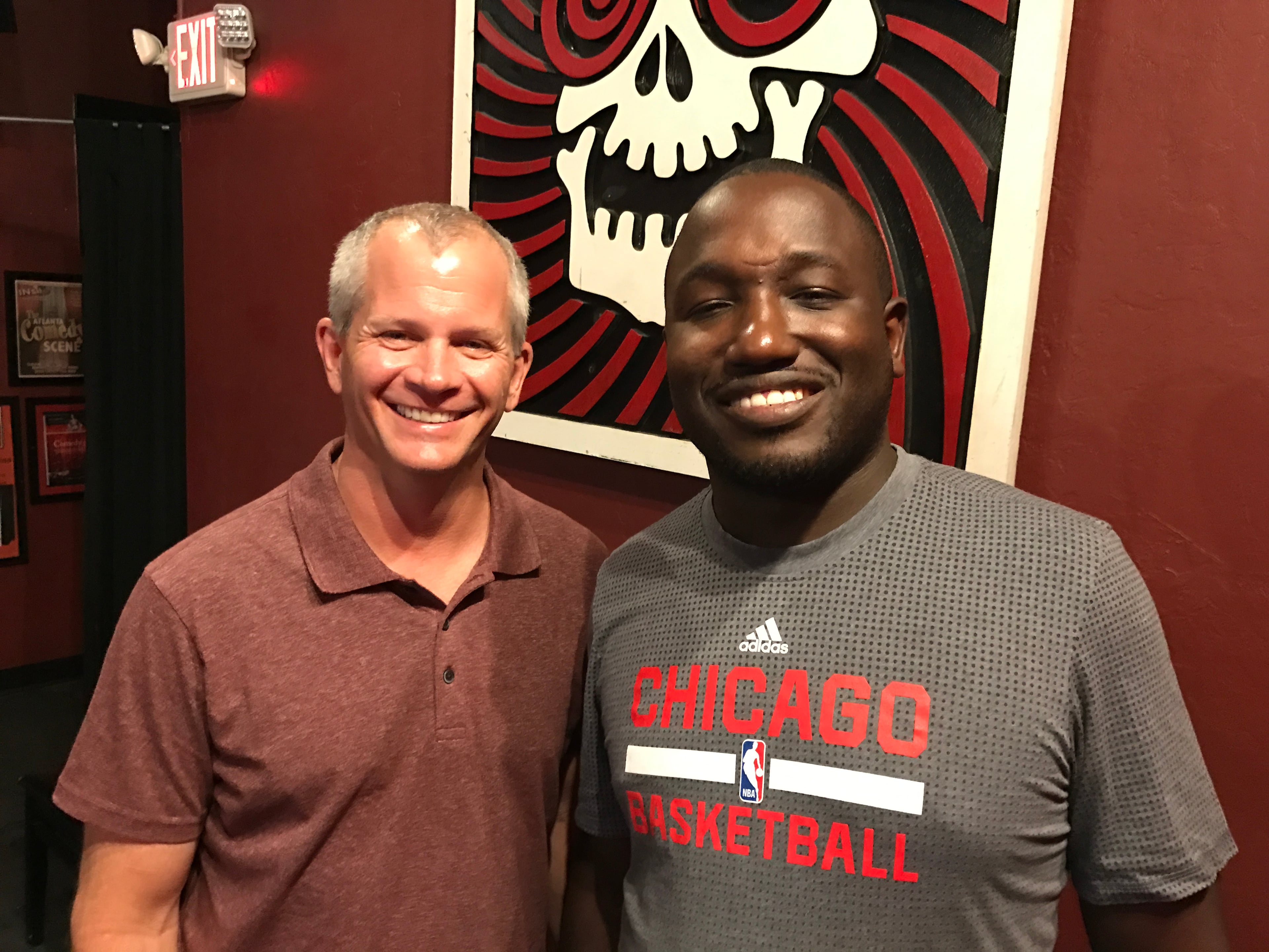 Chiles (left) poses with actor/comedian Hannibal Buress after a taping of Buress' podcast at Laughing Skull. (Rodney Ho/AJC FILE)