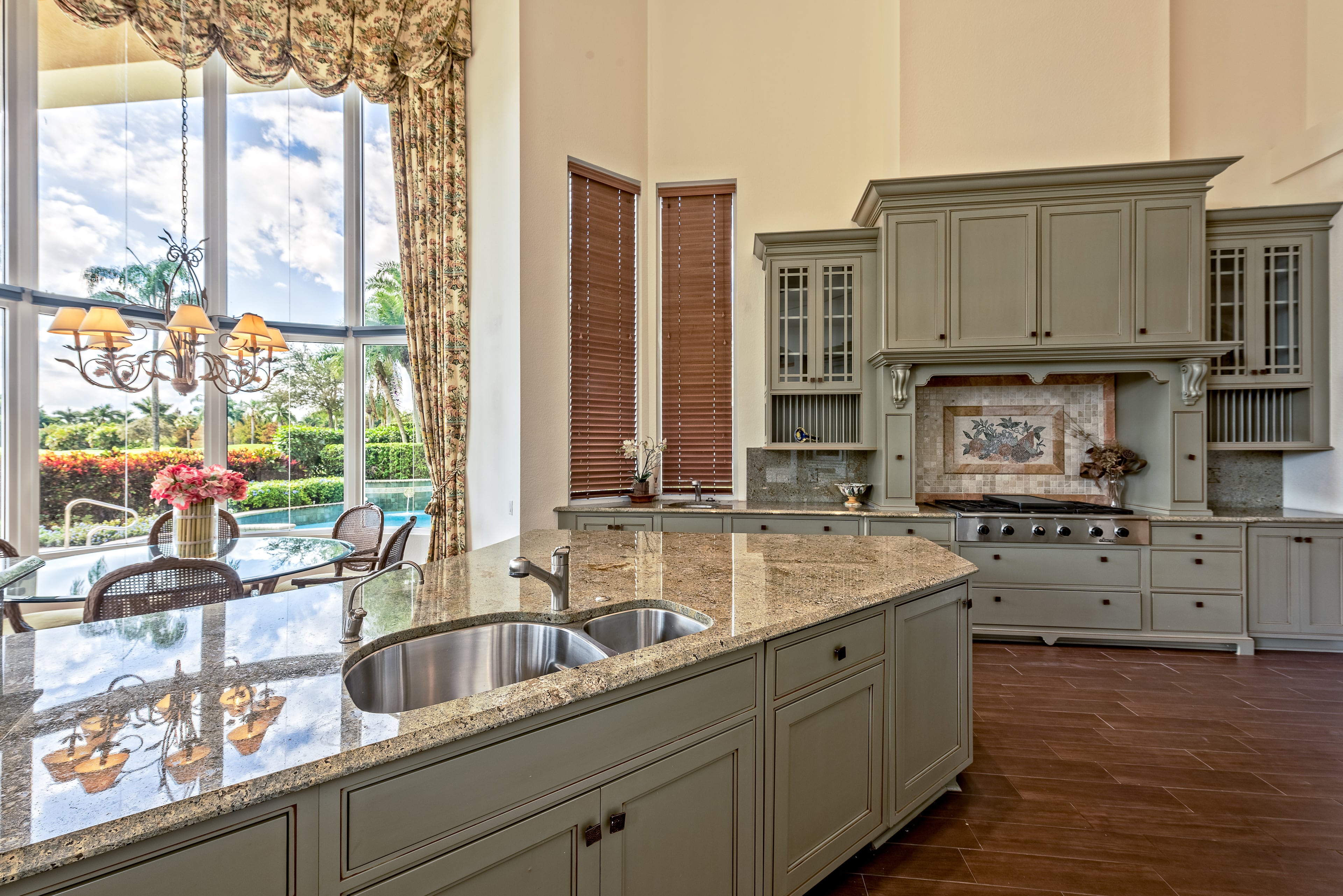 Former GOP presidential hopeful and the future HUD secretary Ben Carson has listed his golf-club community home in Palm Beach, Fla. for $1.2 million. The two-story residence has soaring floor-to-ceiling windows that wonderfully blend the the outside tropical paradise with the interior living spaces. This five bedroom, 6000 ft., and 4.5 bathroom is a mini-mansion that comes with marble floors, custom built-in's throughout, remote operated window coverings along with a tastefully upgraded chefs kitchen. (Listing courtesy ENGEL & VOLKERS Palm Beach)