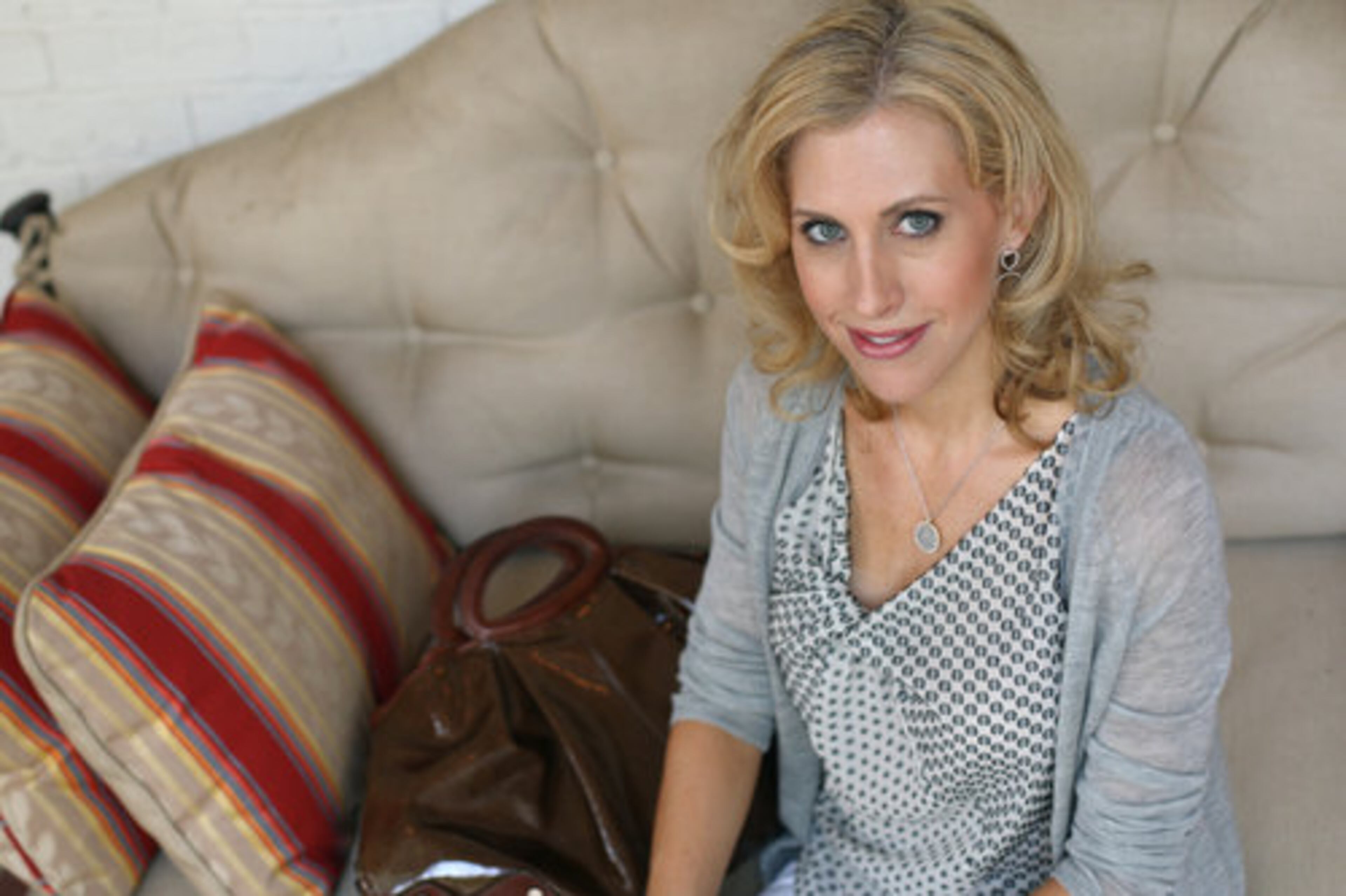 EMILY GIFFIN, 37, of Brookhaven is the New York Times bestselling author of "Love the One You're With," (St. Martin's Press, $13.95). She describes her signature style as "classic with a bit of an edge and chic but always comfortable. Fashion is more about fit and your body than the clothing."