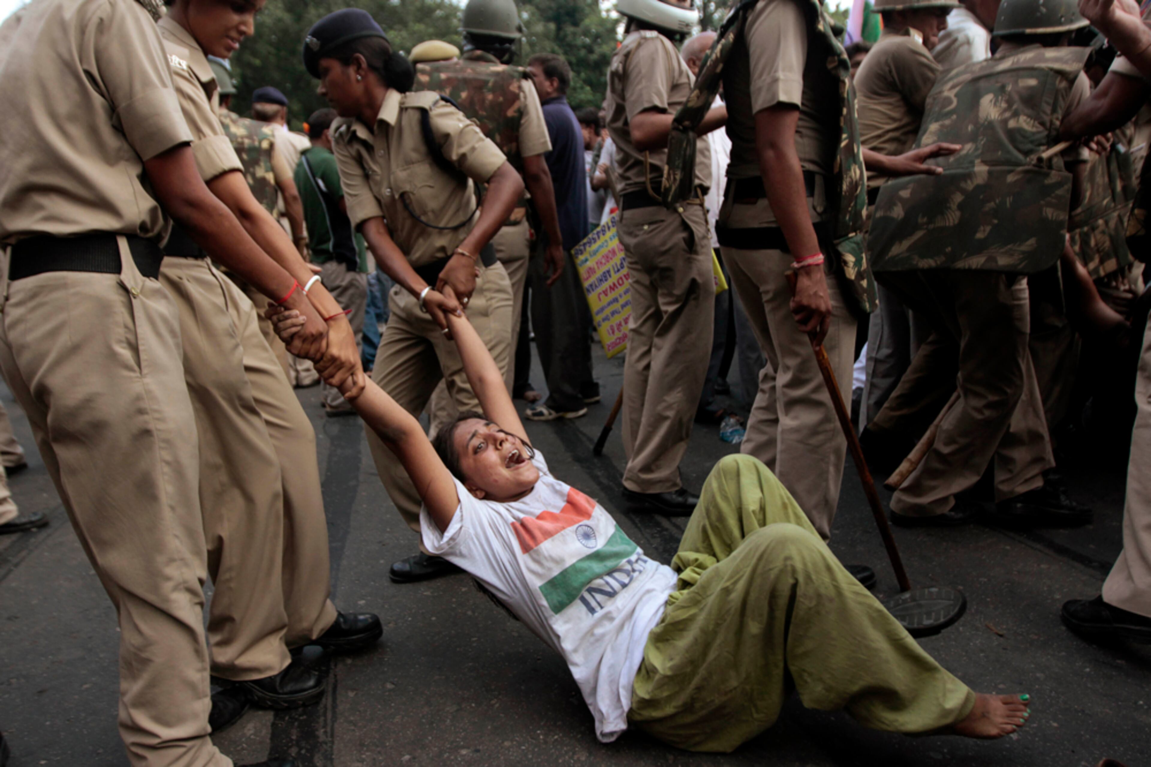 CORRUPTION PROTEST--An Indian anti corruption protester is arrested during a demonstration near Congress party leader Sonia Gandhi's residence in New Delhi, India, Sunday, Aug. 26, 2012. Indian police detained scores of anti-corruption activists who tried to march Sunday to the homes of top political leaders to protest a scandal over the government's sale of coal fields without competitive bidding.