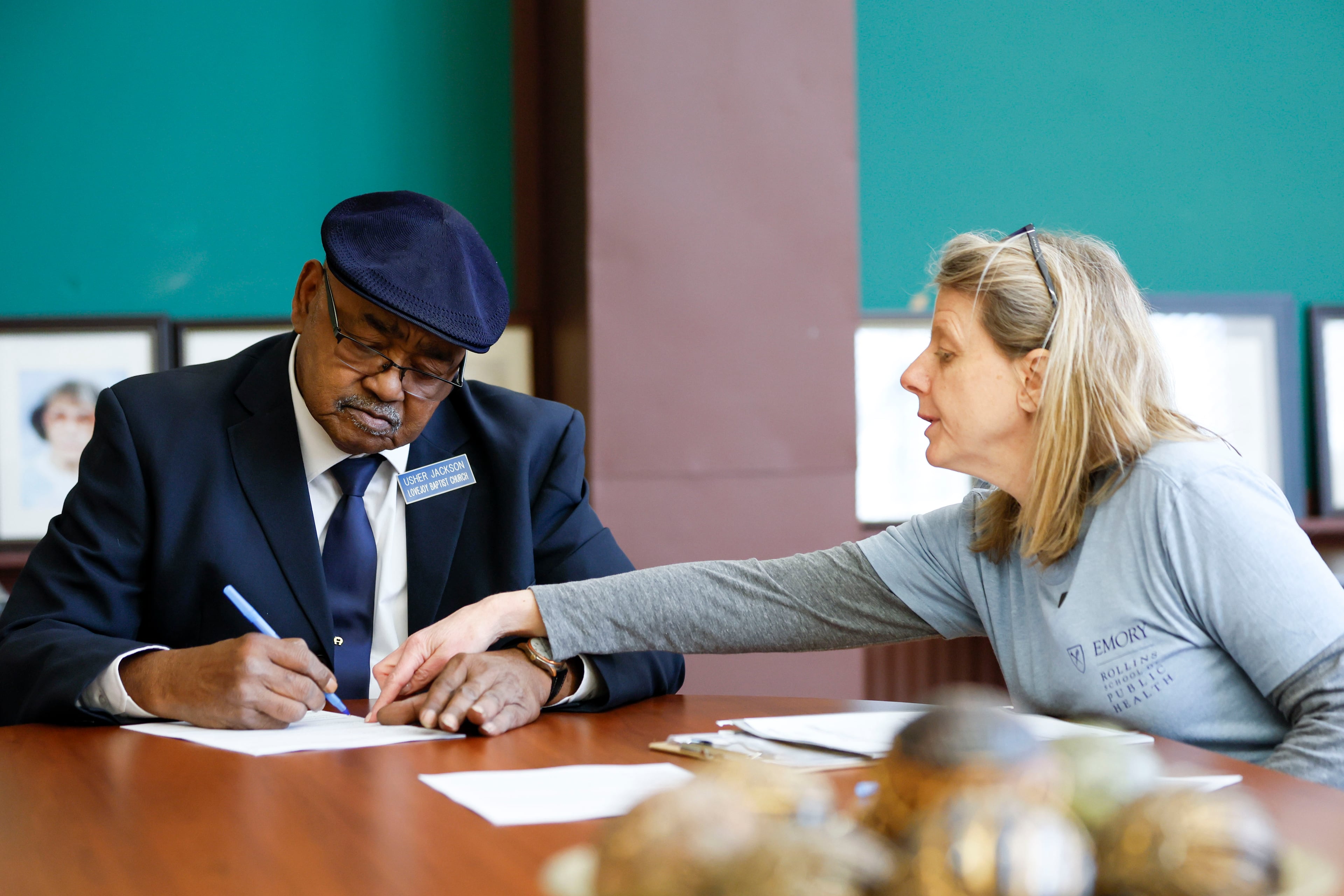 Emory researcher Melanie Pearson presents documents to Rome resident Alvin Jackson on Sunday, February 2, 2025, for approval to participate in a study aiming to identify PFAS, commonly referred to as “forever chemicals,” through blood screening.
(Miguel Martinez/ AJC)