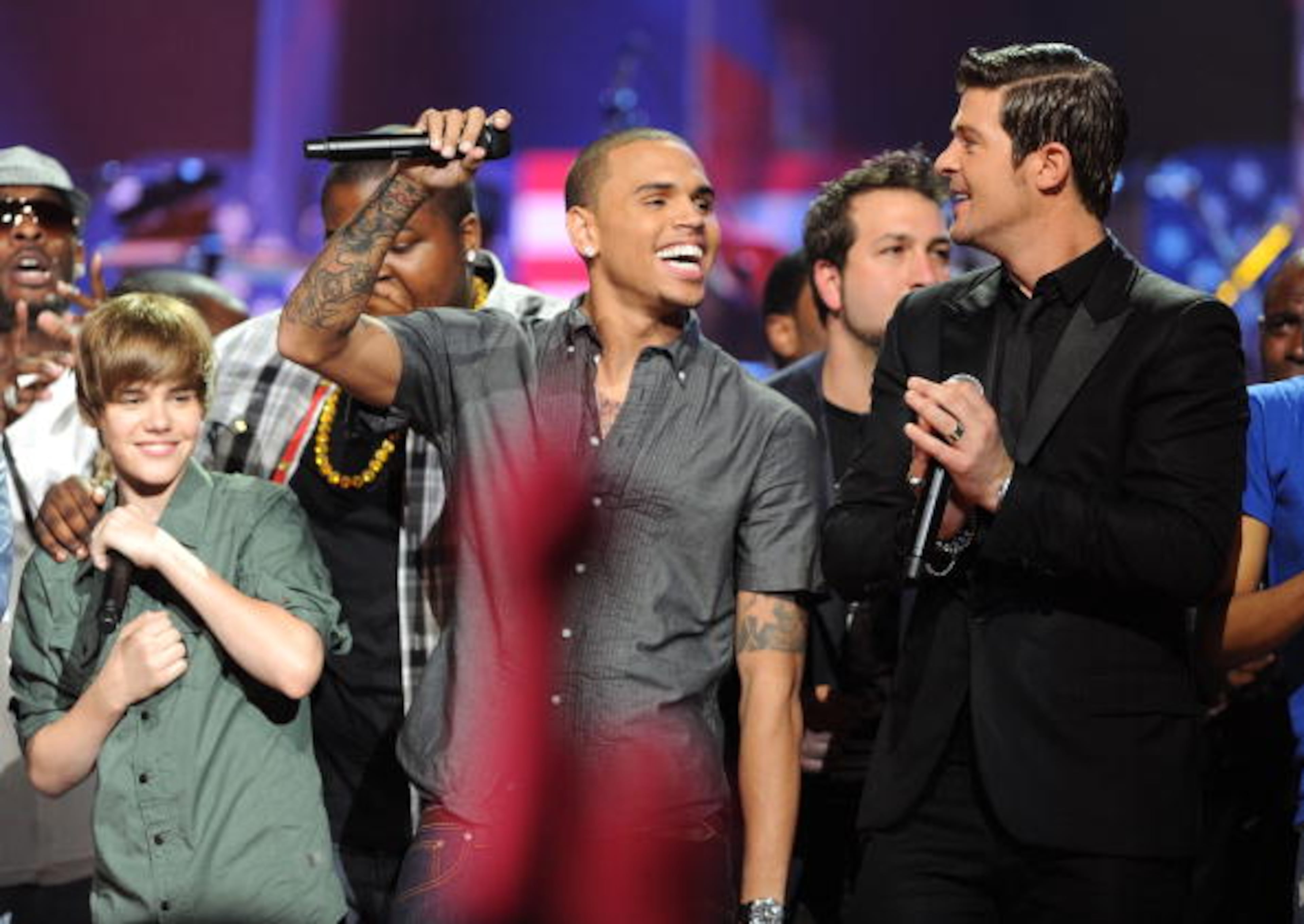 MIAMI - FEBRUARY 05: (L-R) Justin Bieber, Sean Kingston, Chris Brown, Joey Fatone and Robin Thicke performs at the BET SOS Saving Ourselves ? Help for Haiti,? benefit concert and telethon at AmericanAirlines Arena on February 5, 2010 in Miami, Florida. (Photo by Larry Marano/Getty Images)