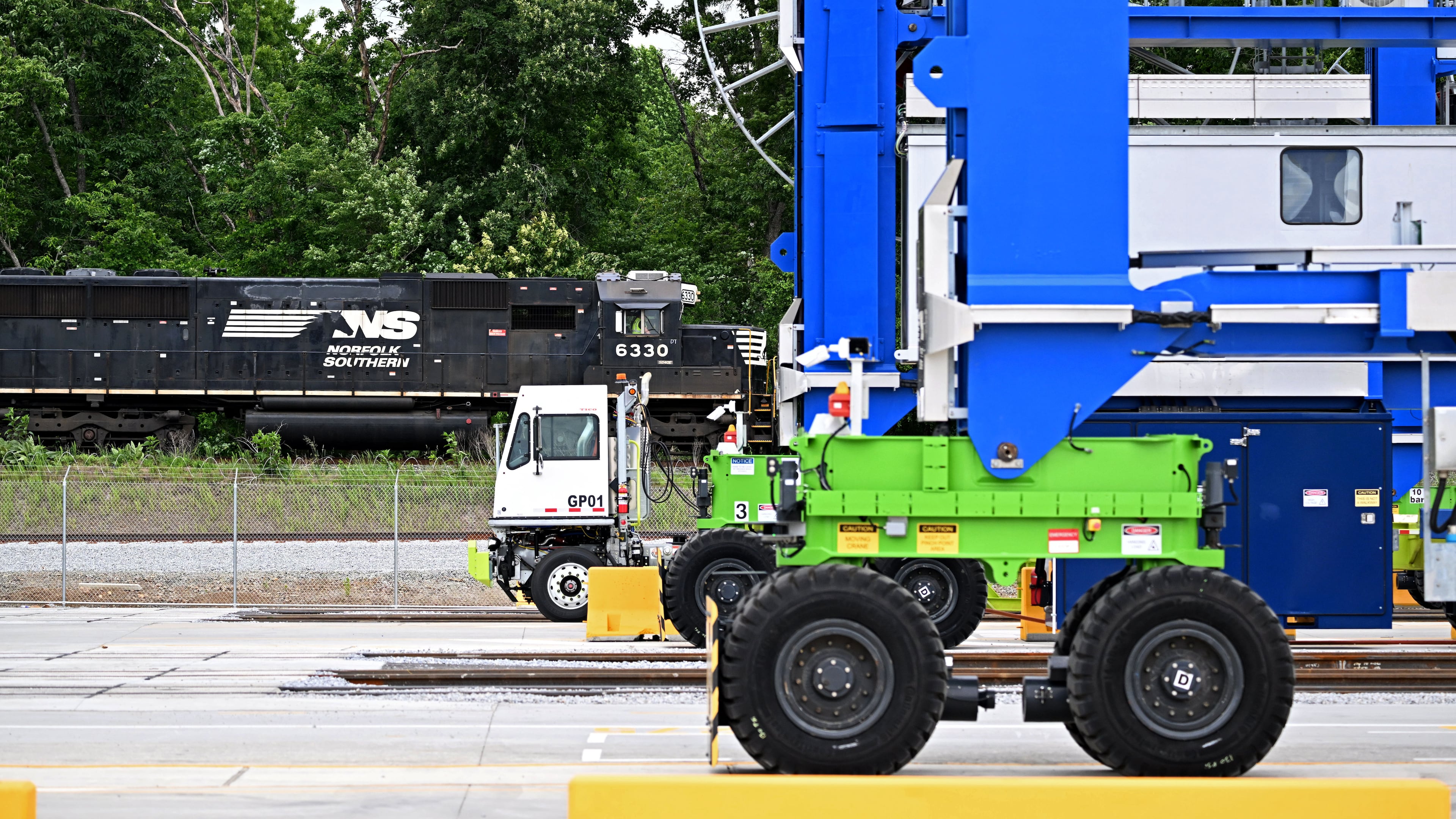 A Norfolk Southern train passes a new inland port in Gainesville on Tuesday, May 12, 2026. The inland port connects Savannah's seaport to North Georgia by rail. (Hyosub Shin/AJC)