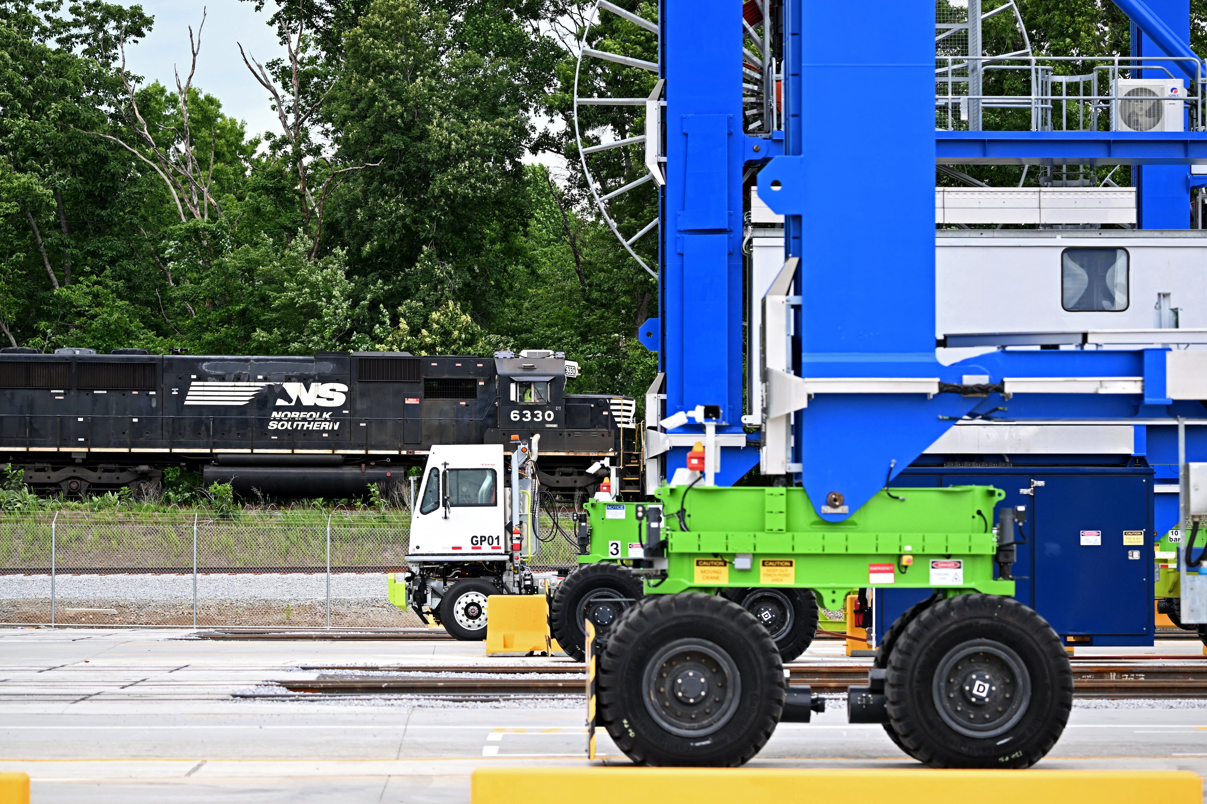 A Norfolk Southern train passes a new inland port in Gainesville on Tuesday, May 12, 2026. The inland port connects Savannah's seaport to North Georgia by rail. (Hyosub Shin/AJC)