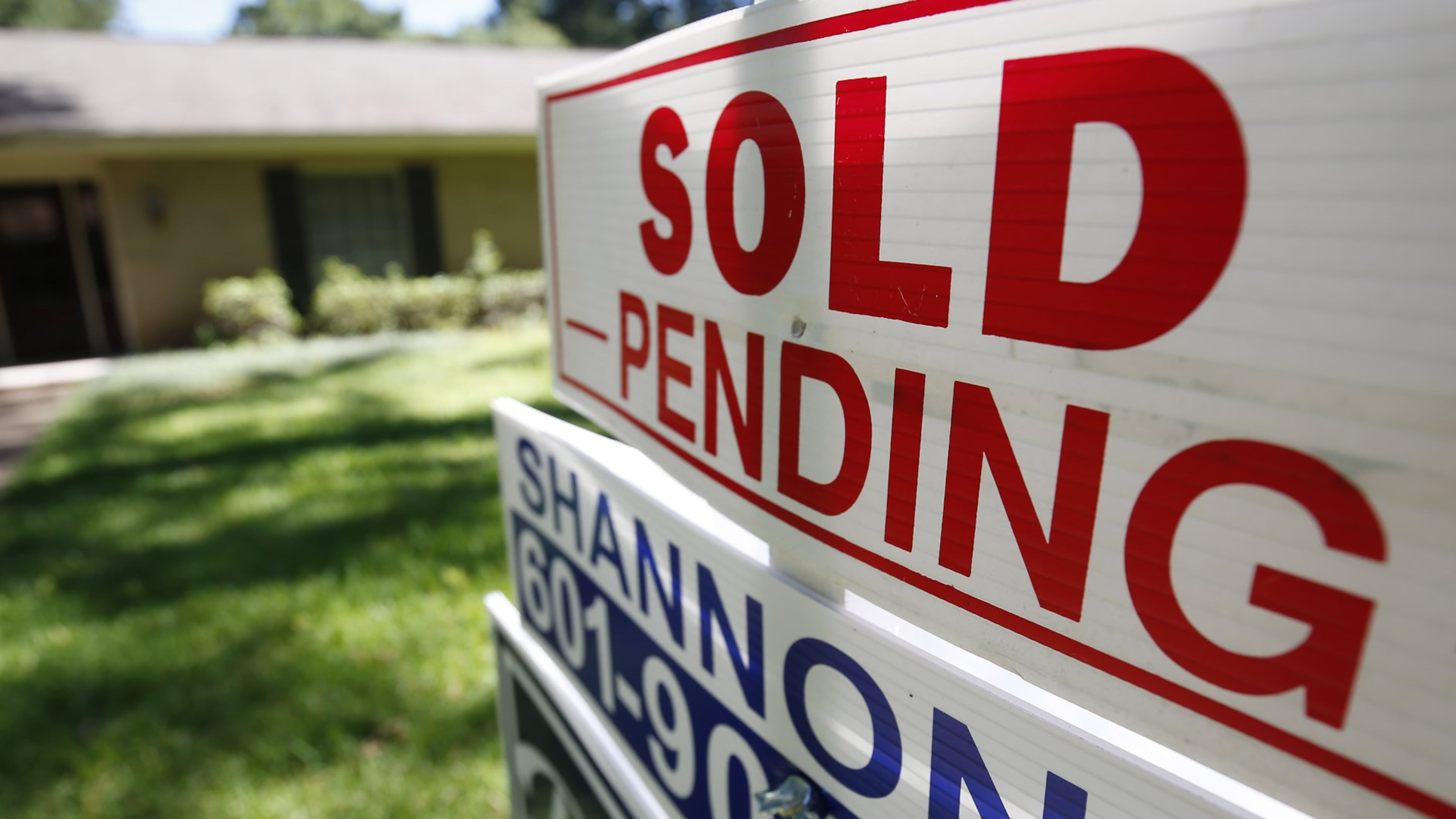 Atlanta saw a surge of buyer interest in homes at the start of the year and the signing of many contracts. Last month, even as joblessness spiked to Depression-era levels. (AP Photo/Rogelio V. Solis, File)