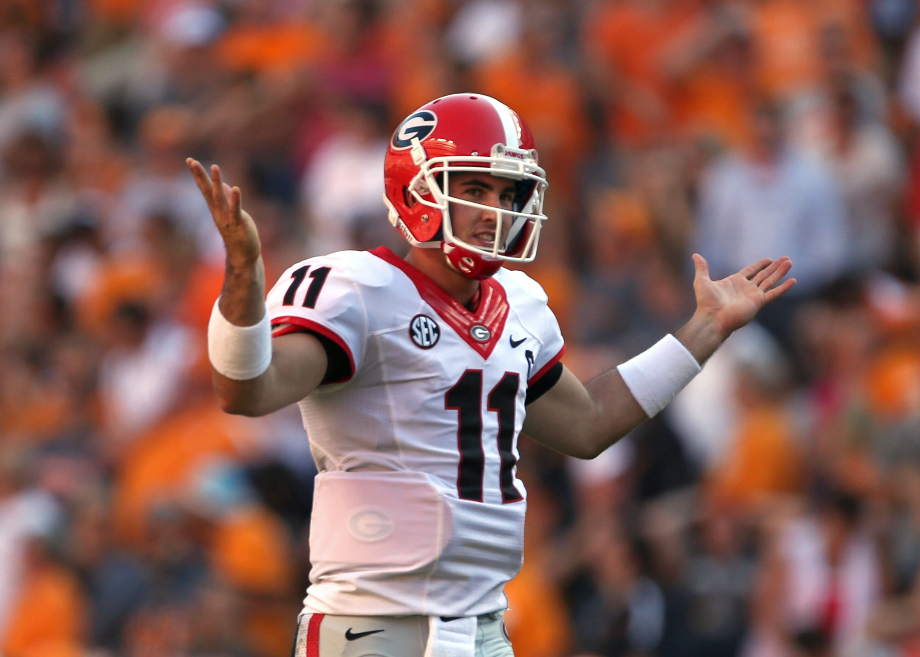 Georgia Bulldogs quarterback Aaron Murray (11) reacts after wide receiver Chris Conley caught a tipped pass on a fourth down conversion in the first half of their game at Neyland Stadium Saturday afternoon in Knoxville, Tn., October 5, 2013.