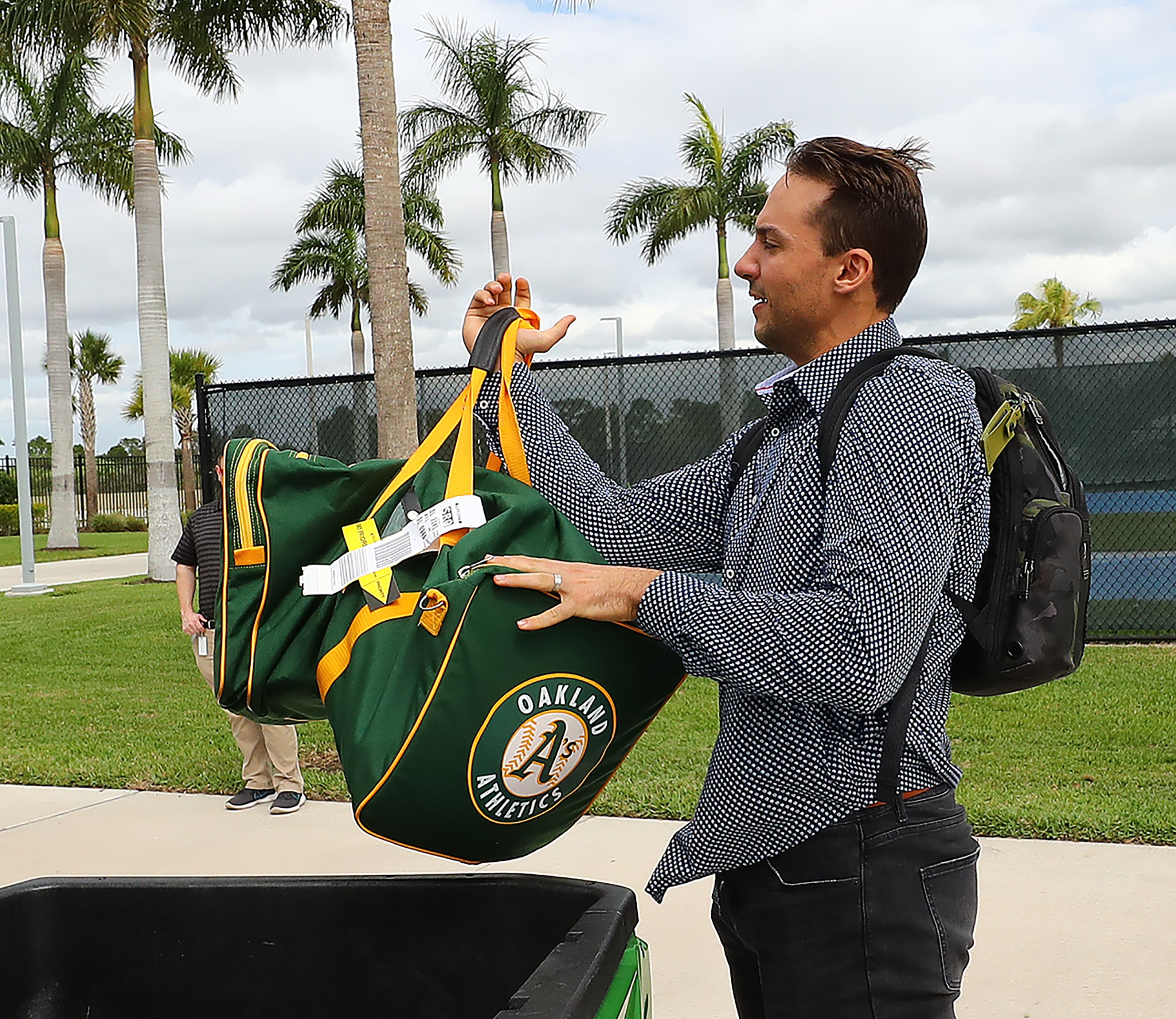 Matt Olson, acquired by the Braves in a trade with the Oakland A's, arrives for his first day with the team Tuesday at its spring training facility in North Port, Fla. (Curtis Compton/ccompton@ajc.com)