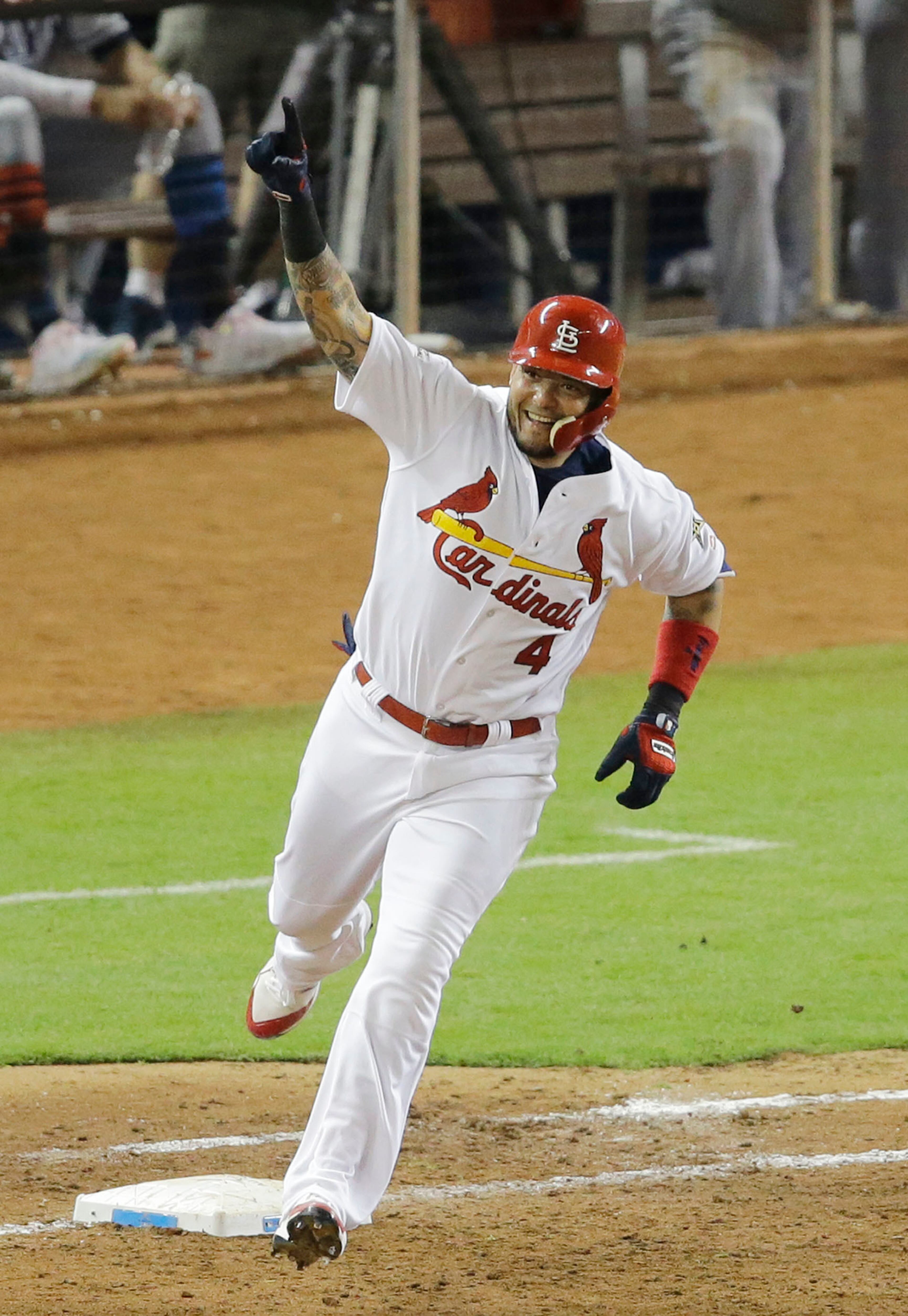 National League's St. Louis Cardinals catcher Yadier Molina (4), rounds the bases after hitting a homerun in the sixth inning, during the MLB baseball All-Star Game, Tuesday, July 11, 2017, in Miami. (AP Photo/Alan Diaz)