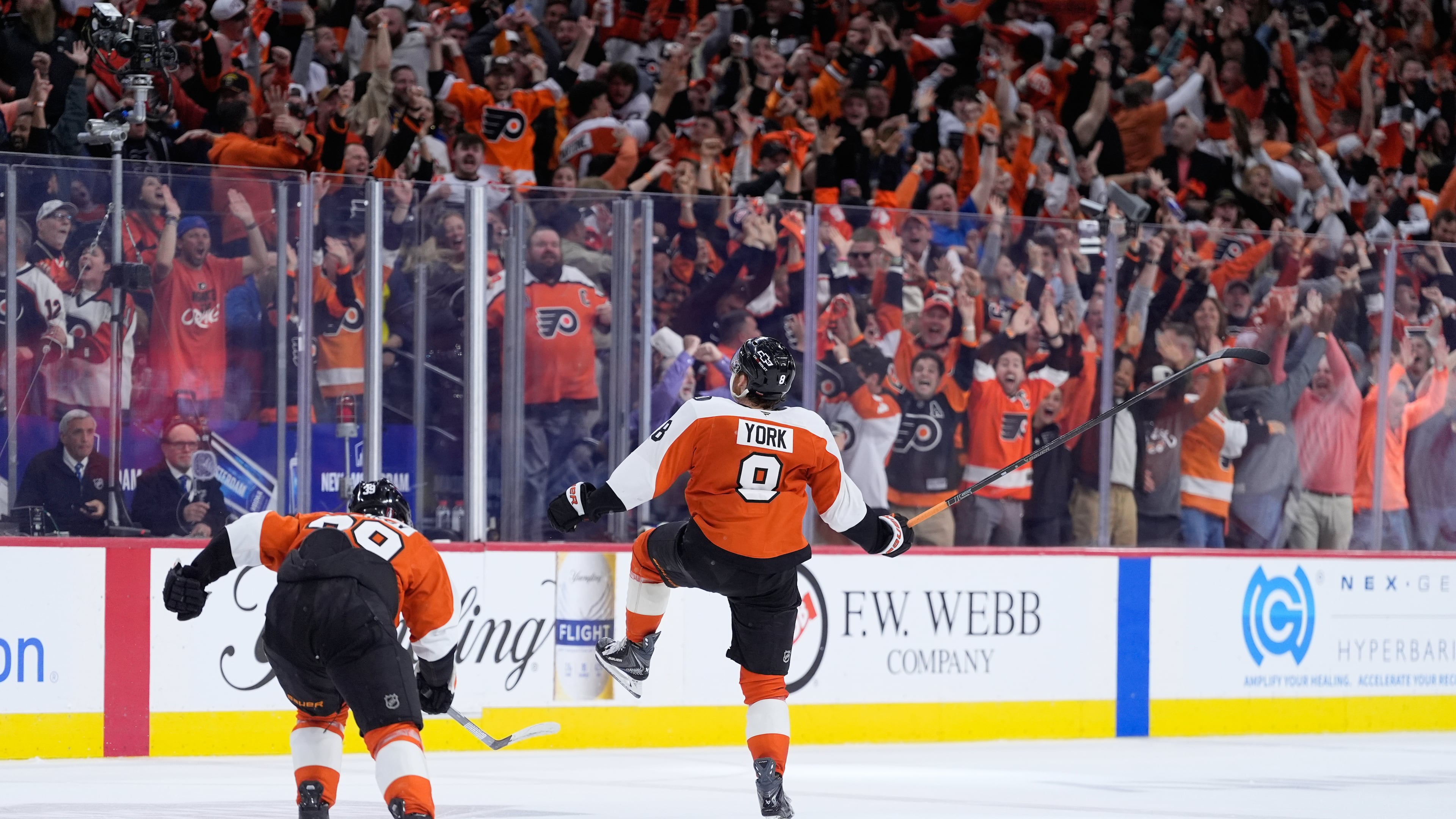 Philadelphia Flyers' Cam York (8) celebrates after scoring the game-winning goal during overtime in Game 6 against the Pittsburgh Penguins in the first round of the NHL hockey Stanley Cup playoffs series Wednesday, April 29, 2026, in Philadelphia. (AP Photo/Matt Slocum)