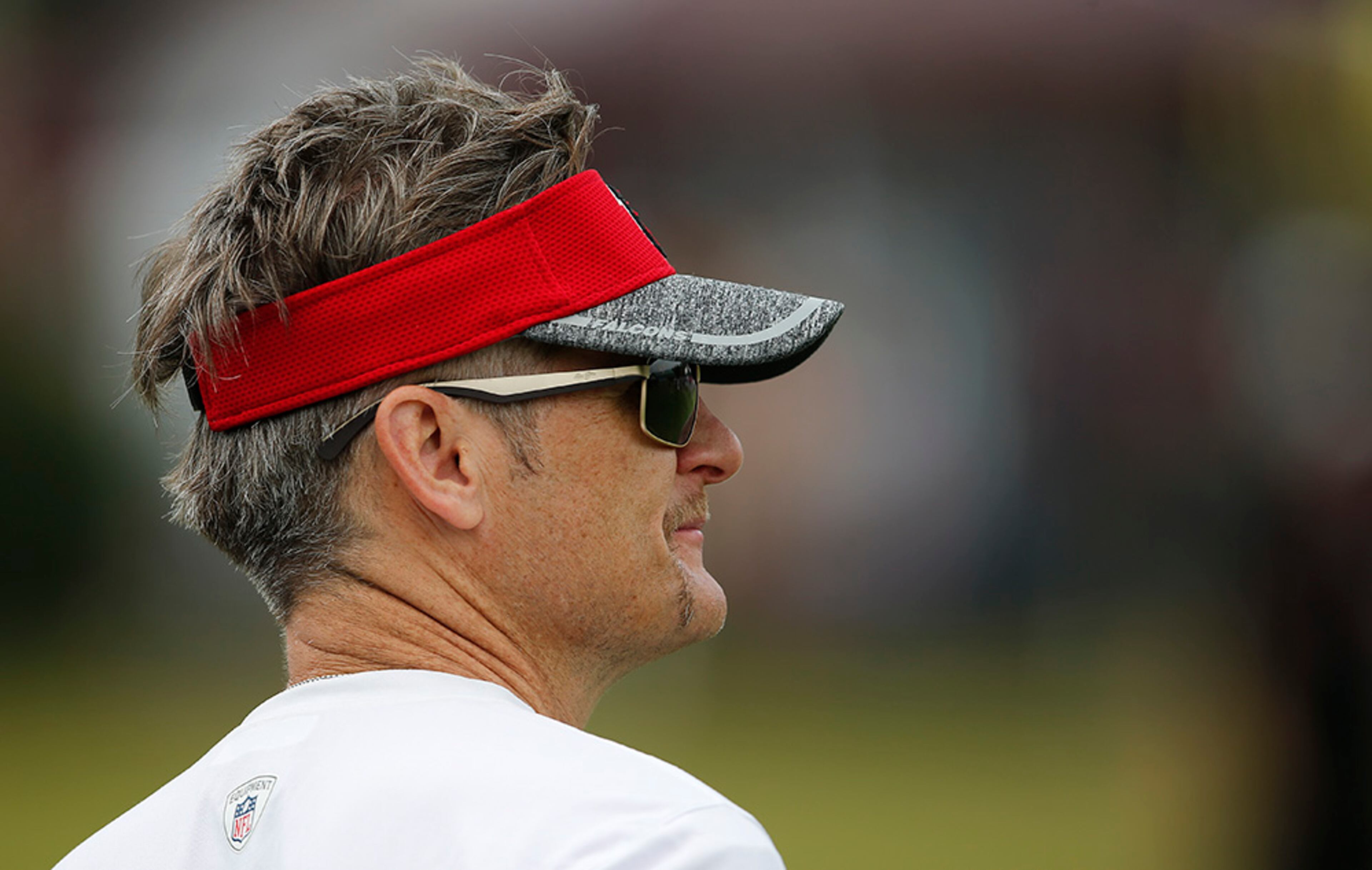 Atlanta Falcons general manager Thomas Dimitroff watches during practice Thursday, Aug. 4, 2016, in Flowery Branch, Ga.