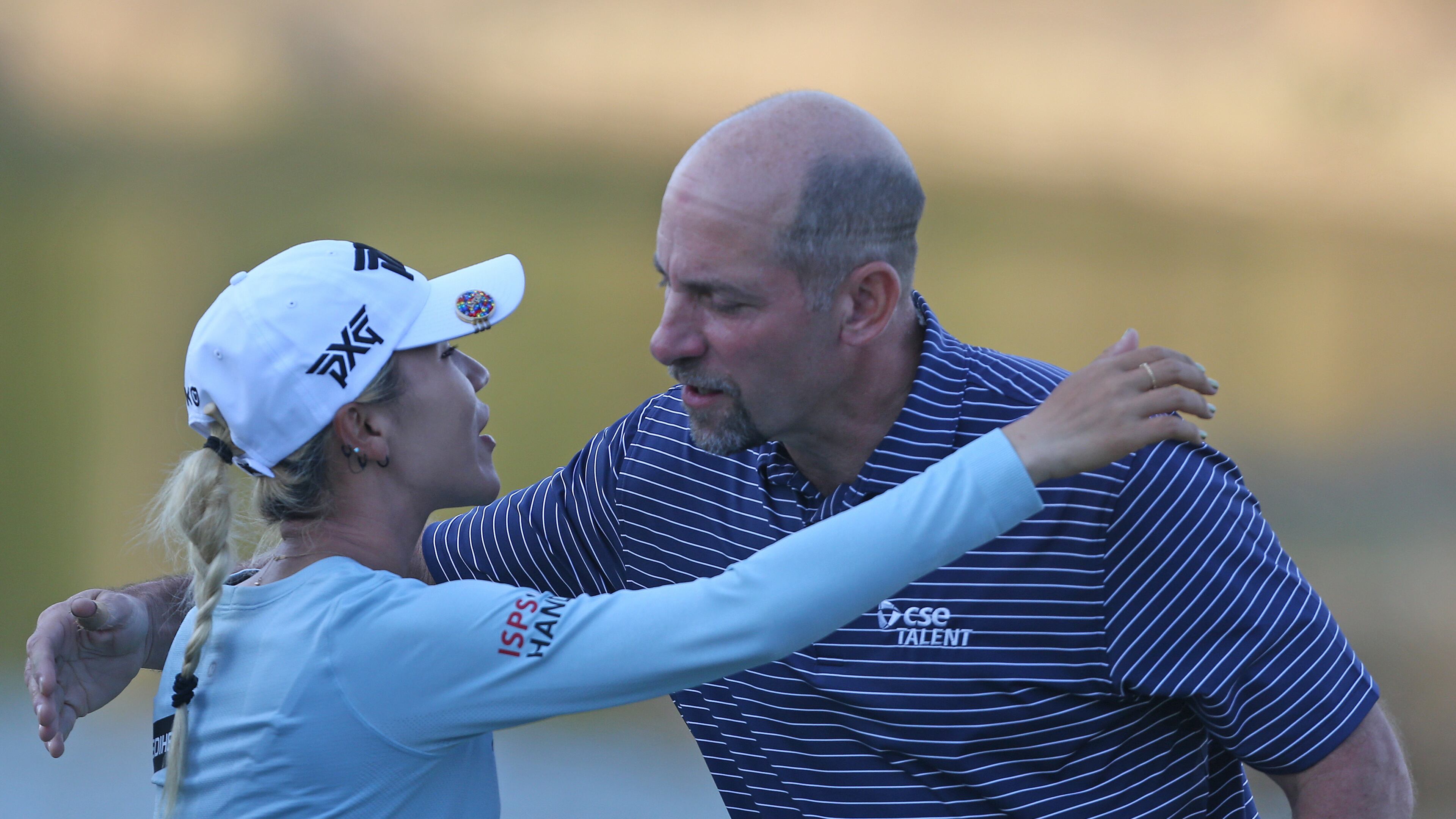 Lydia Ko of New Zealand hugs former MLB pitcher John Smoltz on the 18th hole after the third round of the Diamond Resorts Tournament of Champions at Tranquilo Golf Course at Four Seasons Golf and Sports Club Orlando on January 19, 2019 in Lake Buena Vista, Florida. (Photo by Matt Sullivan/Getty Images)