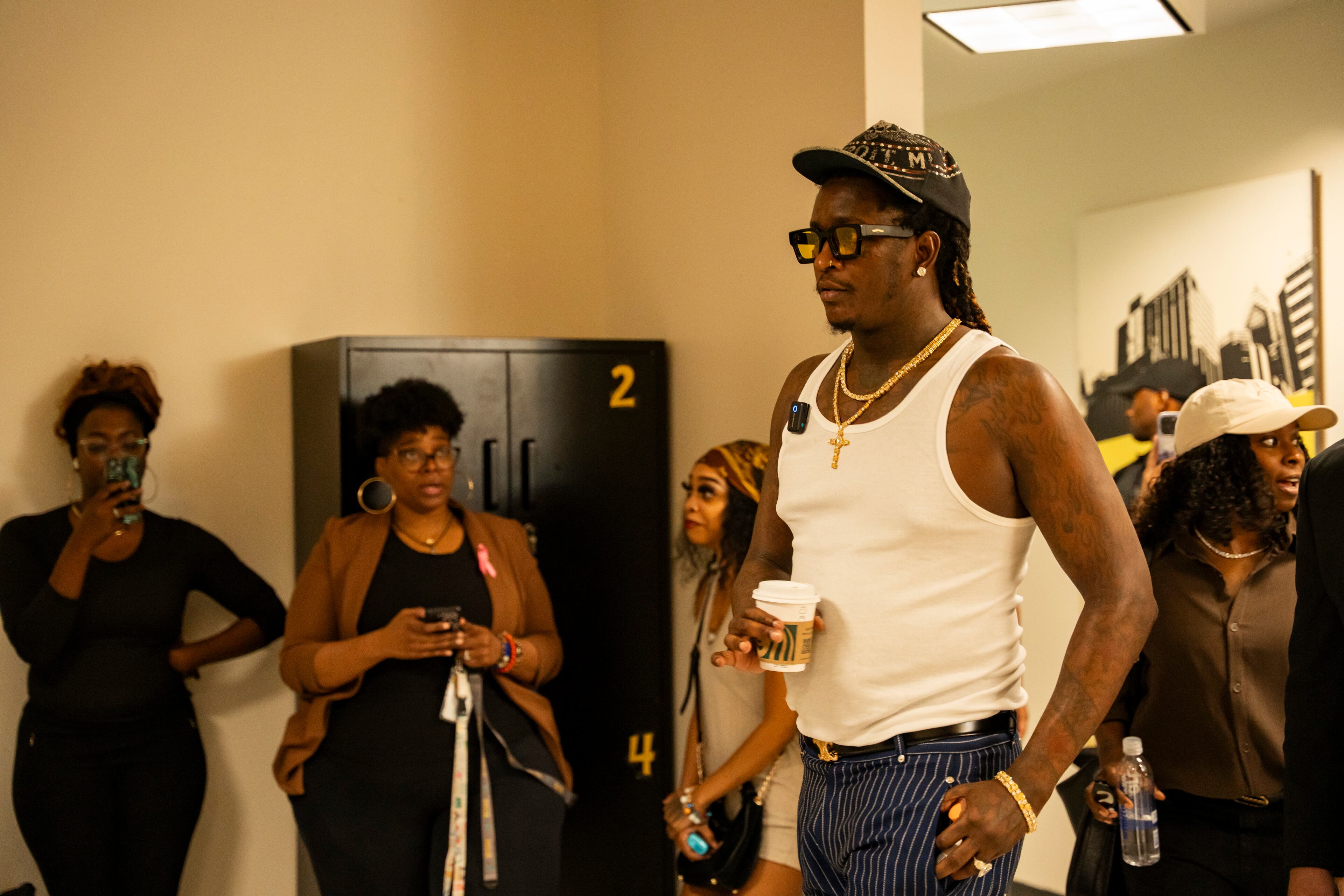 Jeffery Williams, known as rapper Young Thug, enters Skyview High School, Friday, Aug. 1, 2025, in Atlanta, as part of his court-mandated anti-gang outreach, one of the few conditions under which he is allowed in the city. (Olivia Bowdoin for the AJC)
