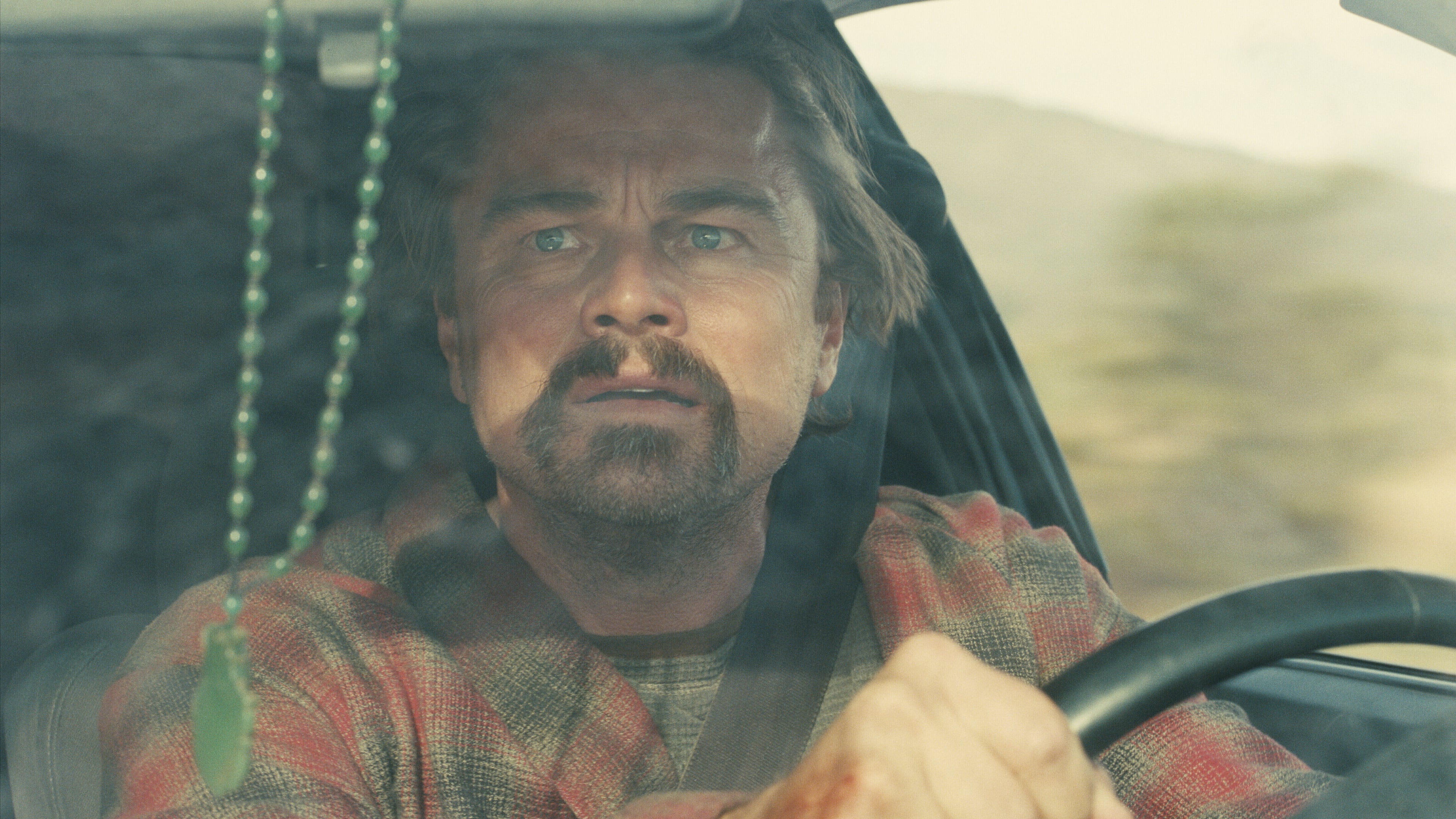 This image released by Warner Bros. Pictures shows Leonardo DiCaprio in a scene from "One Battle After Another." (Warner Bros. Pictures via AP)