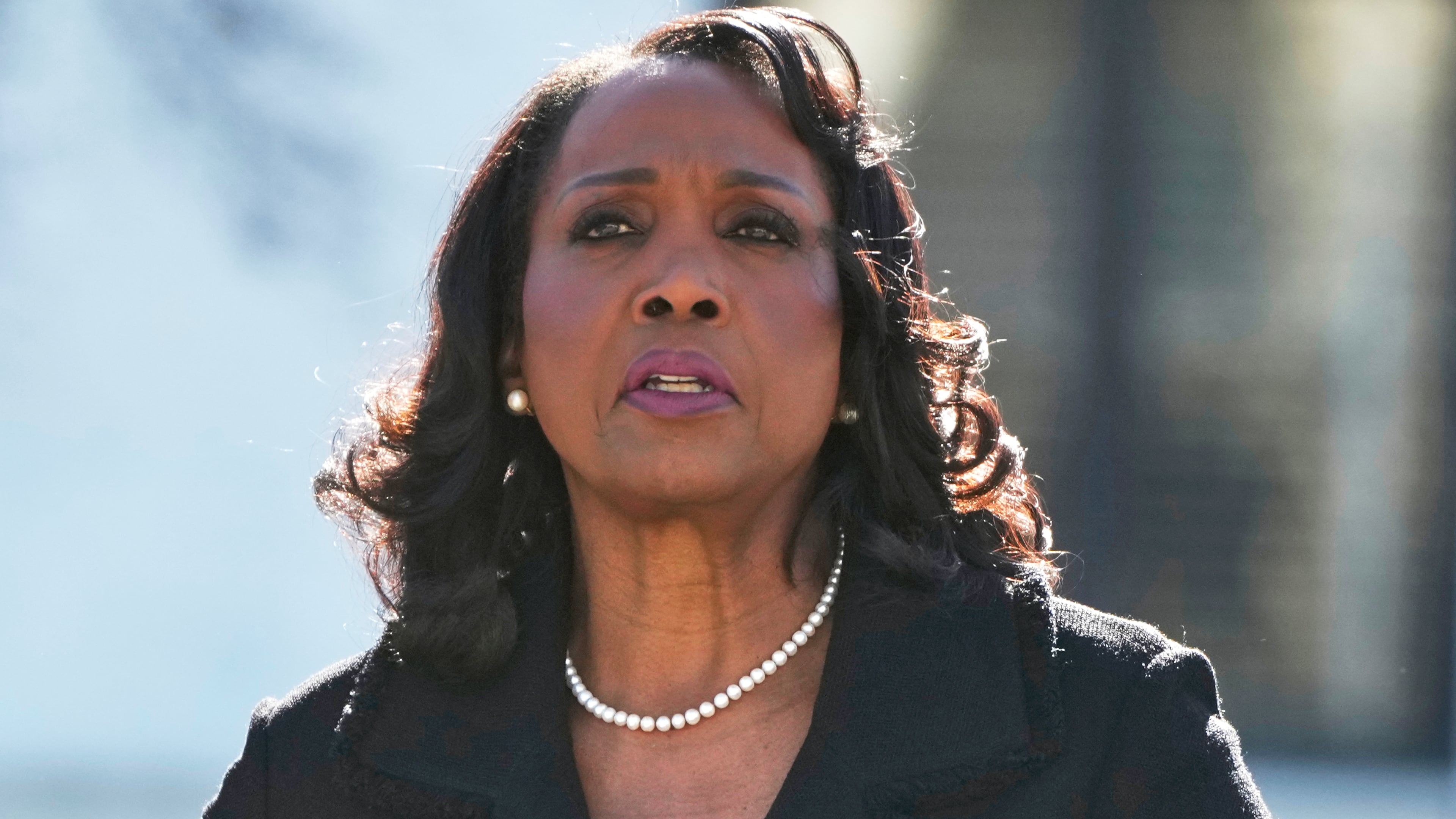FILE - Federal Reserve Board of Governors member Lisa Cook leaves the Supreme Court in Washington, Jan. 21, 2026. (AP Photo/Mark Schiefelbein, File)