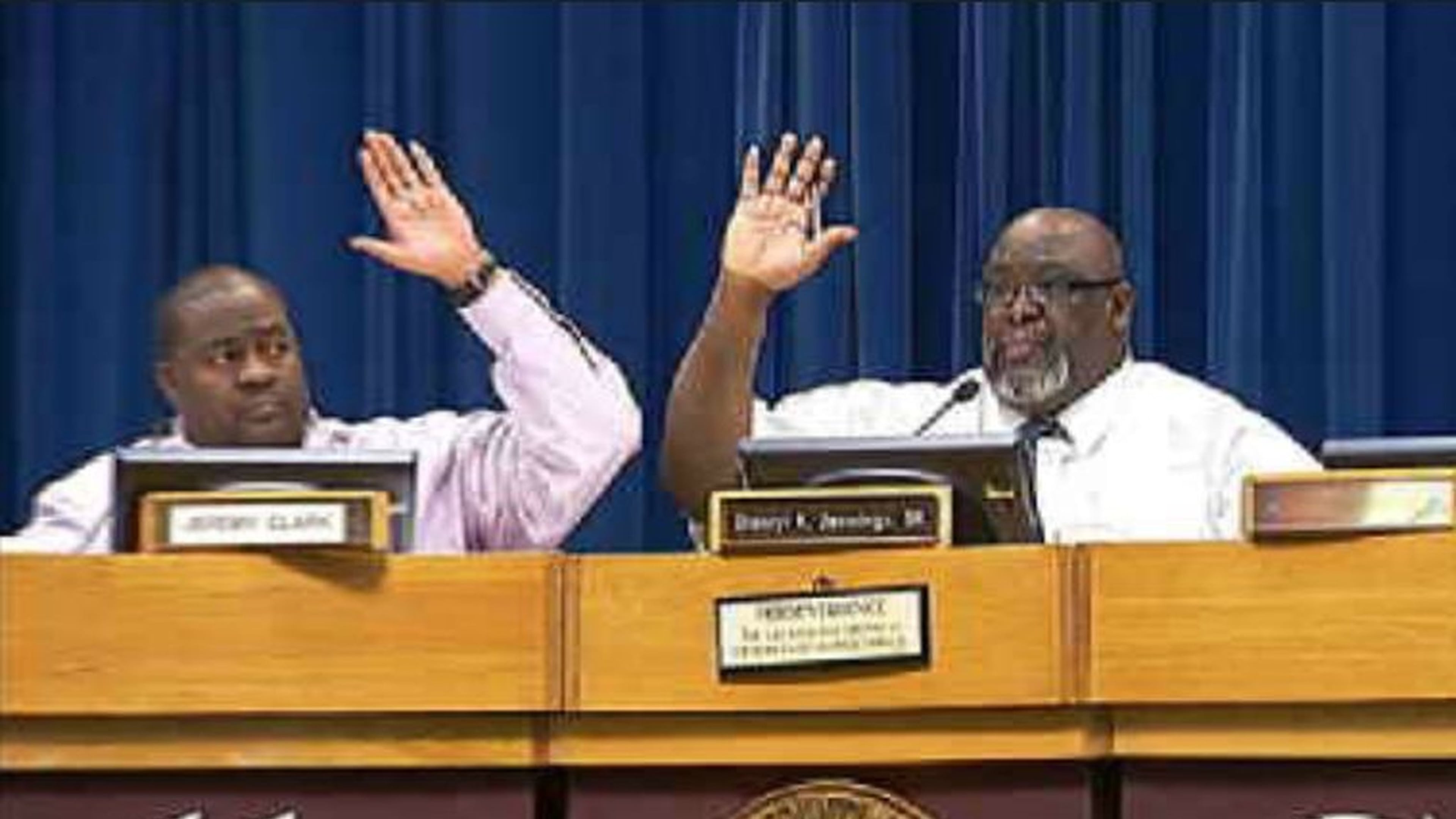 Jerry Clark and Darryl Jennings Sr., members of the DeKalb Zoning Board of Appeals, voted in November 2012 to approve a permit for a Lulu Billiards to operate as a nightclub. CREDIT: WSB-TV