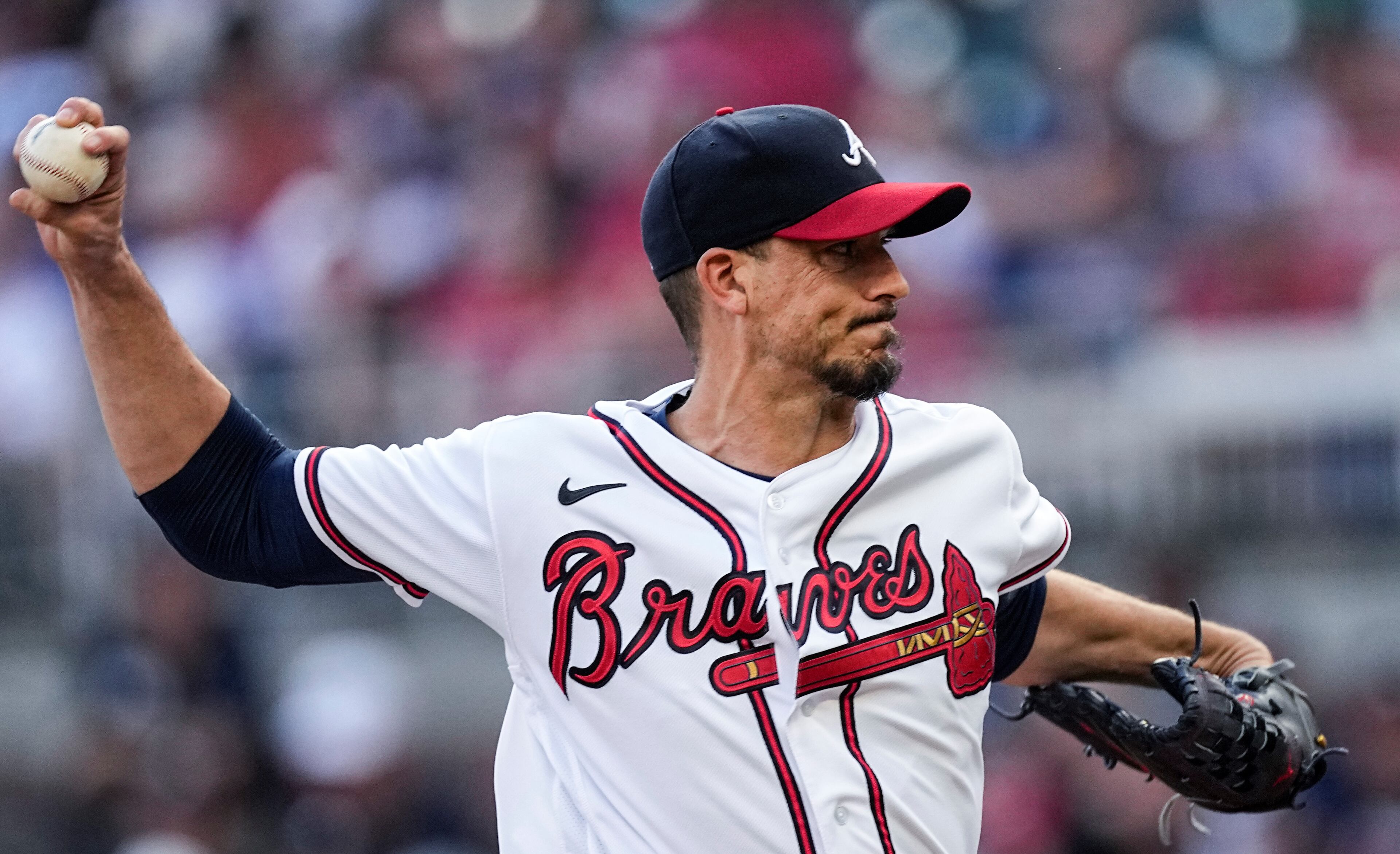 Braves starter Charlie Morton (50) delivers in the first inning of a baseball game against New York Mets, Wednesday, June 7, 2023, in Atlanta. (AP Photo/John Bazemore)