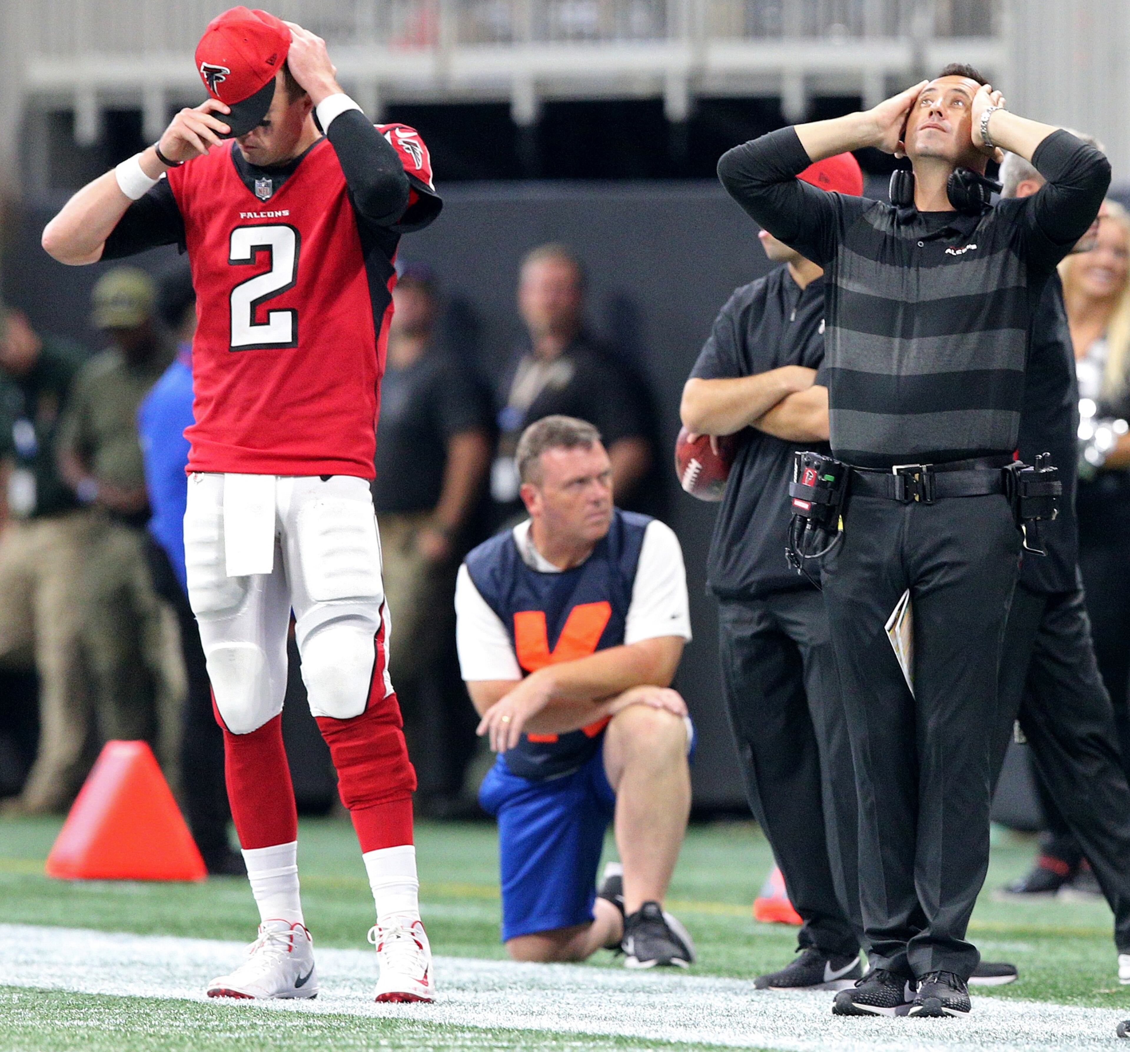 September 23, 2018 Atlanta: Atlanta Falcons quarterback Matt Ryan and offensive coordinator Steve Sarkisian react on the sidelines as the New Orleans Saints win the game 43-37 on a Dree Brees touchdown in overtime during an NFL football game on Sunday, Sept 23, 2018, in Atlanta. Curtis Compton/ccompton@ajc.com