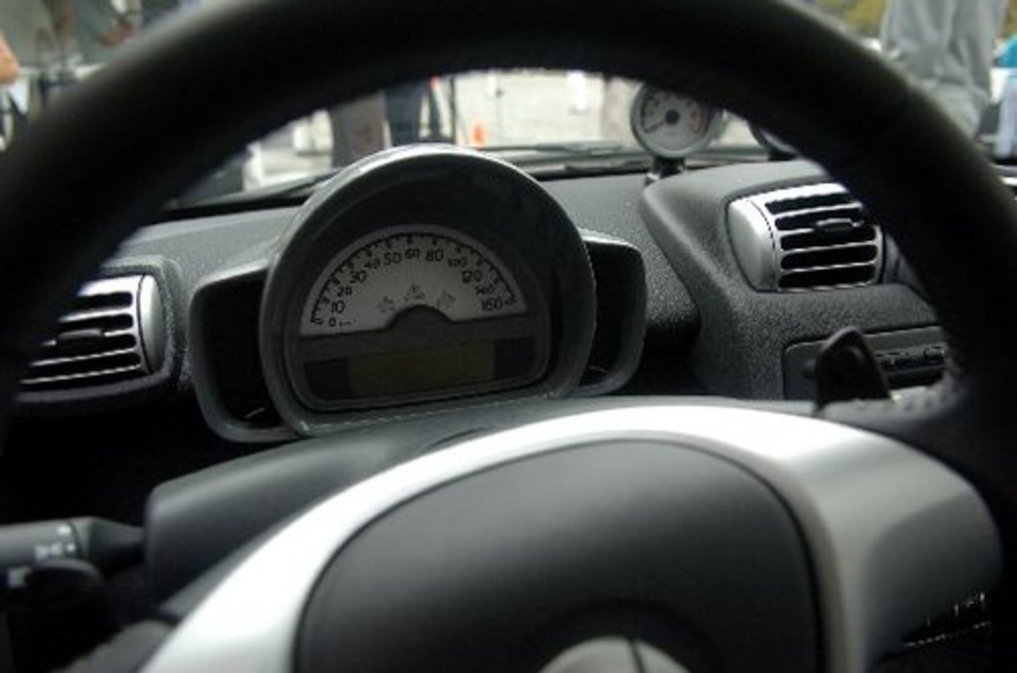 The dashboard of the Smart Fortwo from the driver's side.