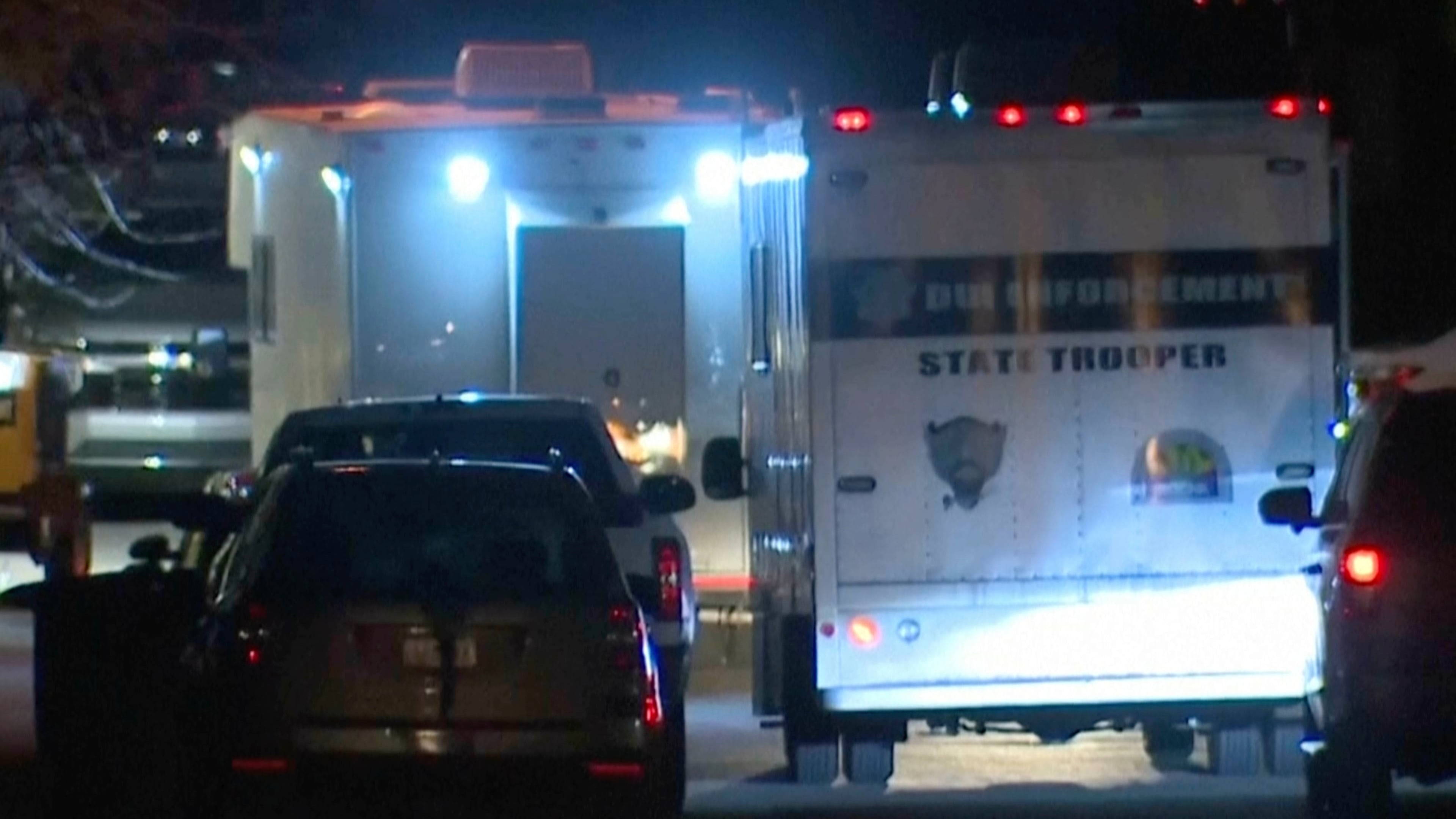 In this grab taken from video, emergency cervices work at a scene of Police Helicopter Crash in Flagstaff, Arizona, the night from Feb. 4 to 5, 2026. (ABC15 Arizona via AP)