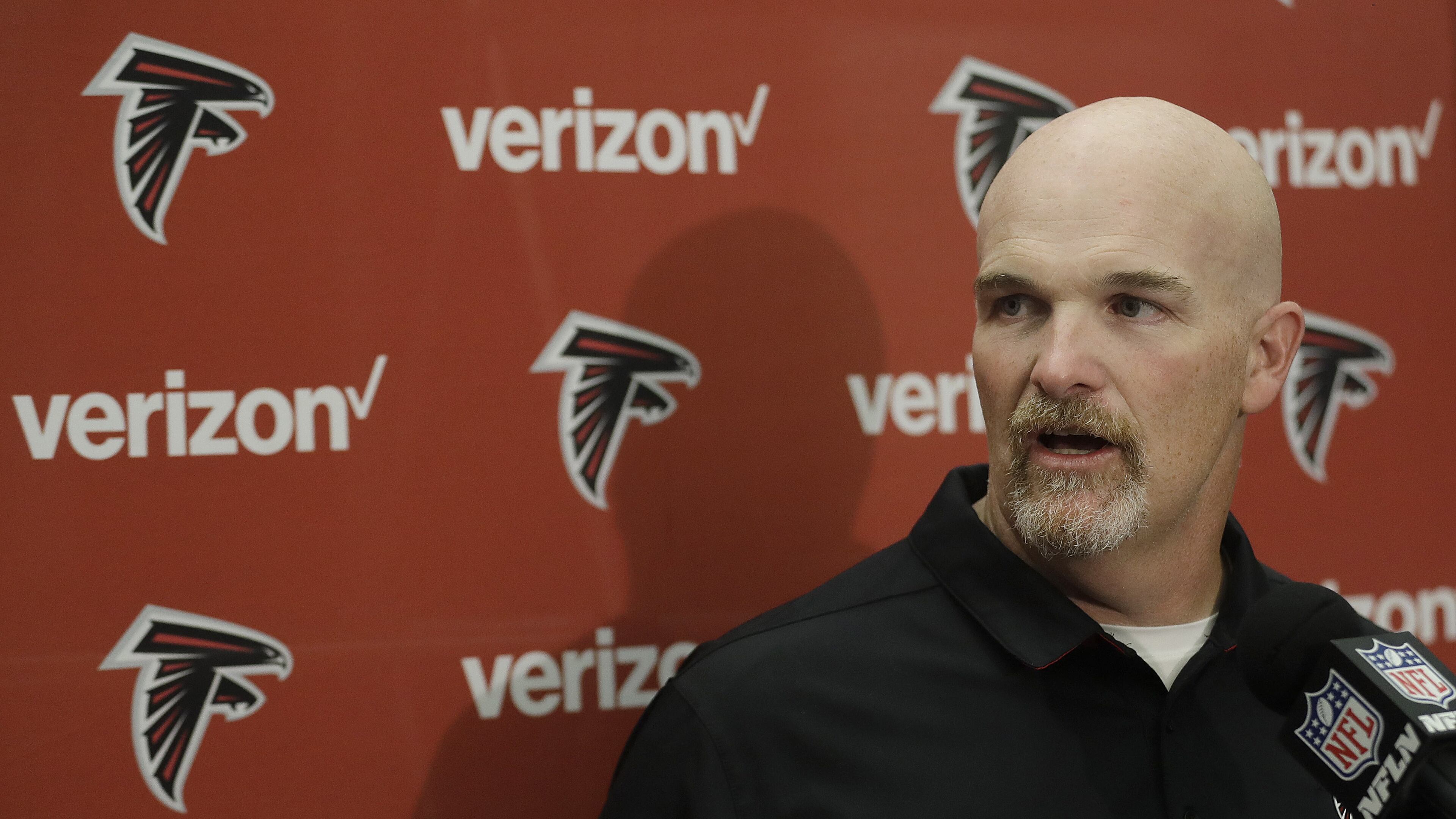 Falcons coach Dan Quinn and general manager Thomas Dimitroff sent roses to players’ wives. (AP Photo/Marcio Jose Sanchez)