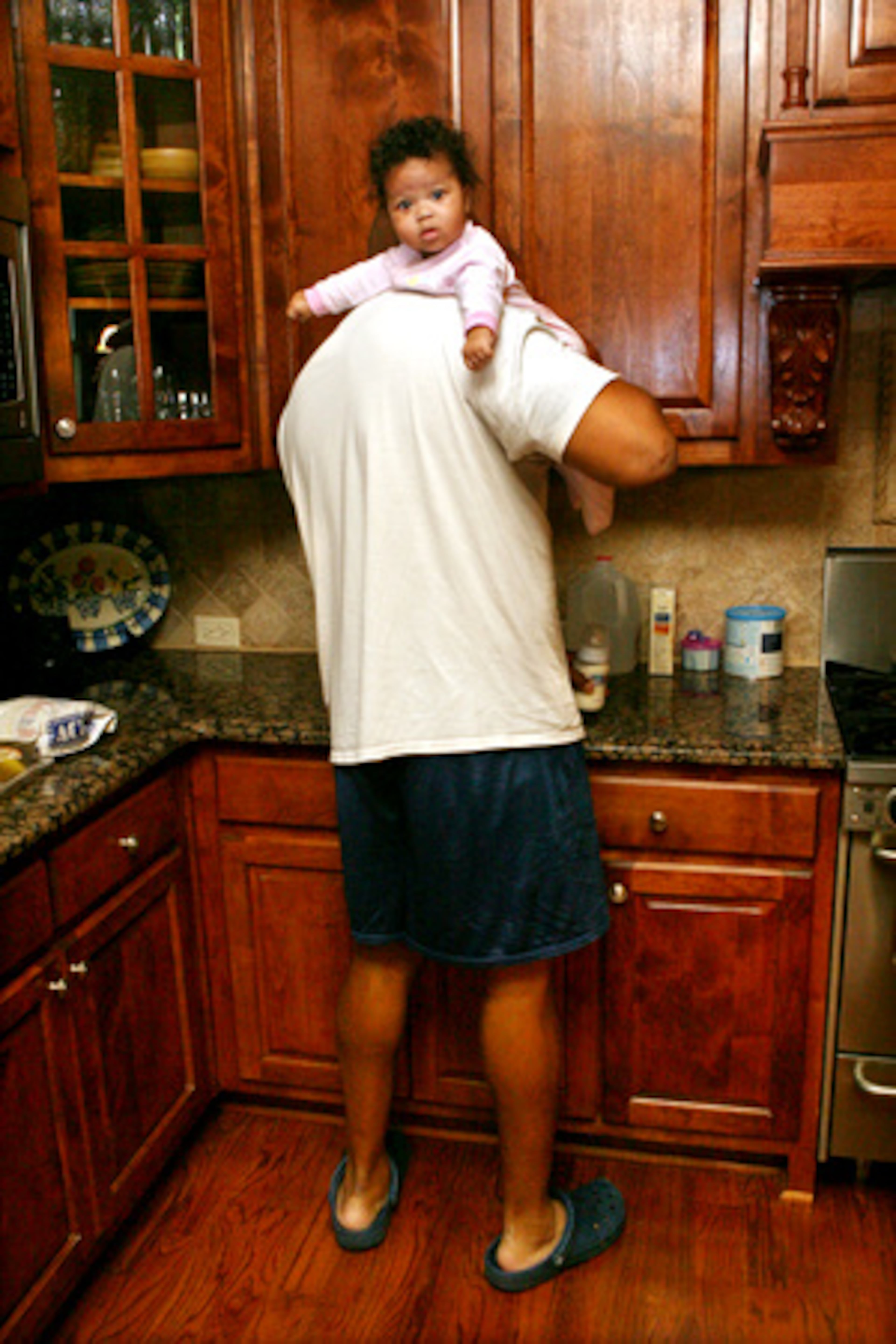 Eric Beverly gave up an NFL football career to spend more time with 4-month-old daughter Lia, while his wife, Danielle, undergoes treatment.