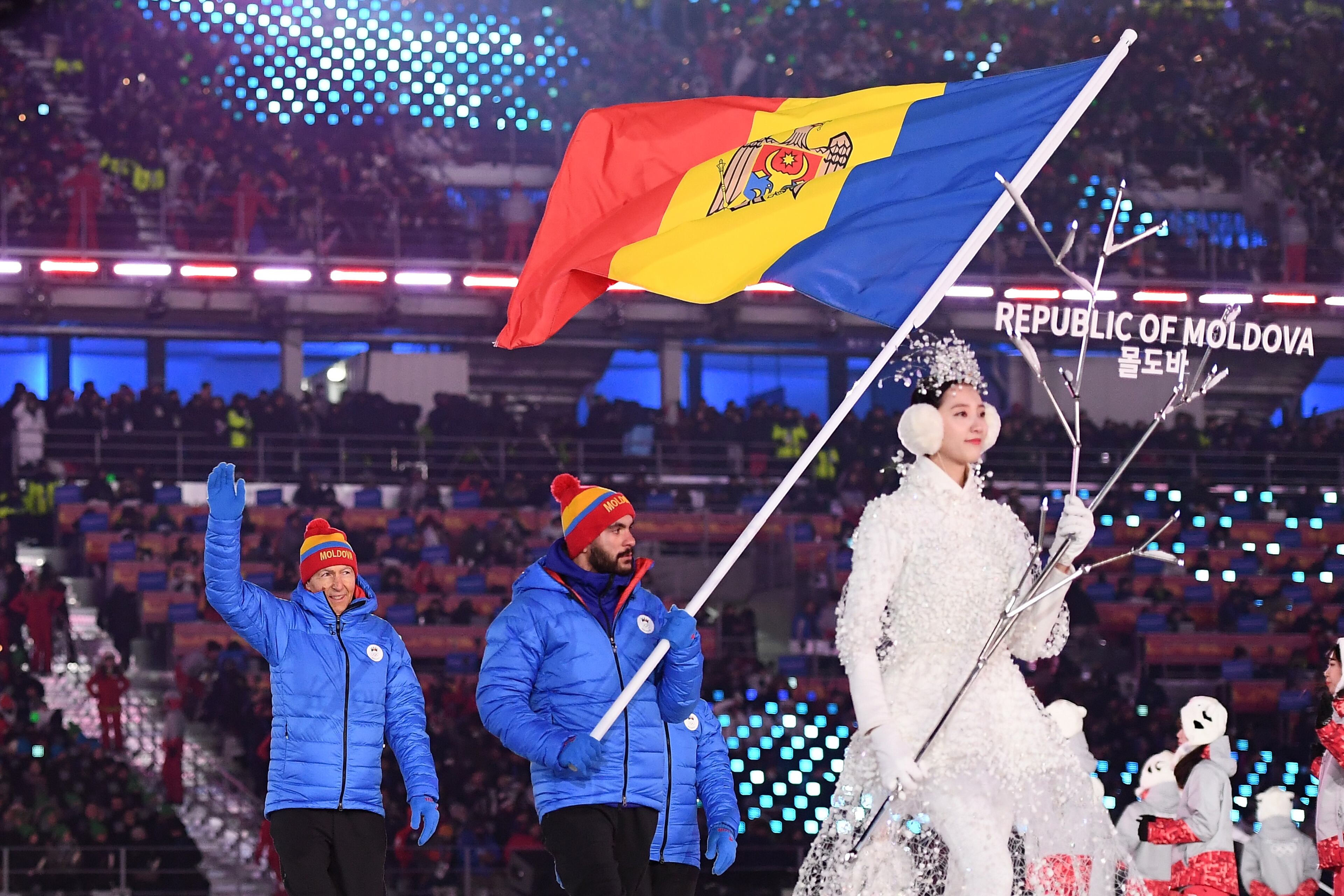 PYEONGCHANG-GUN, SOUTH KOREA - FEBRUARY 09: Flag bearer Nicolae Gaiduc of Republic of Moldova leads the team during the Opening Ceremony of the PyeongChang 2018 Winter Olympic Games at PyeongChang Olympic Stadium on February 9, 2018 in Pyeongchang-gun, South Korea. (Photo by Quinn Rooney/Getty Images)