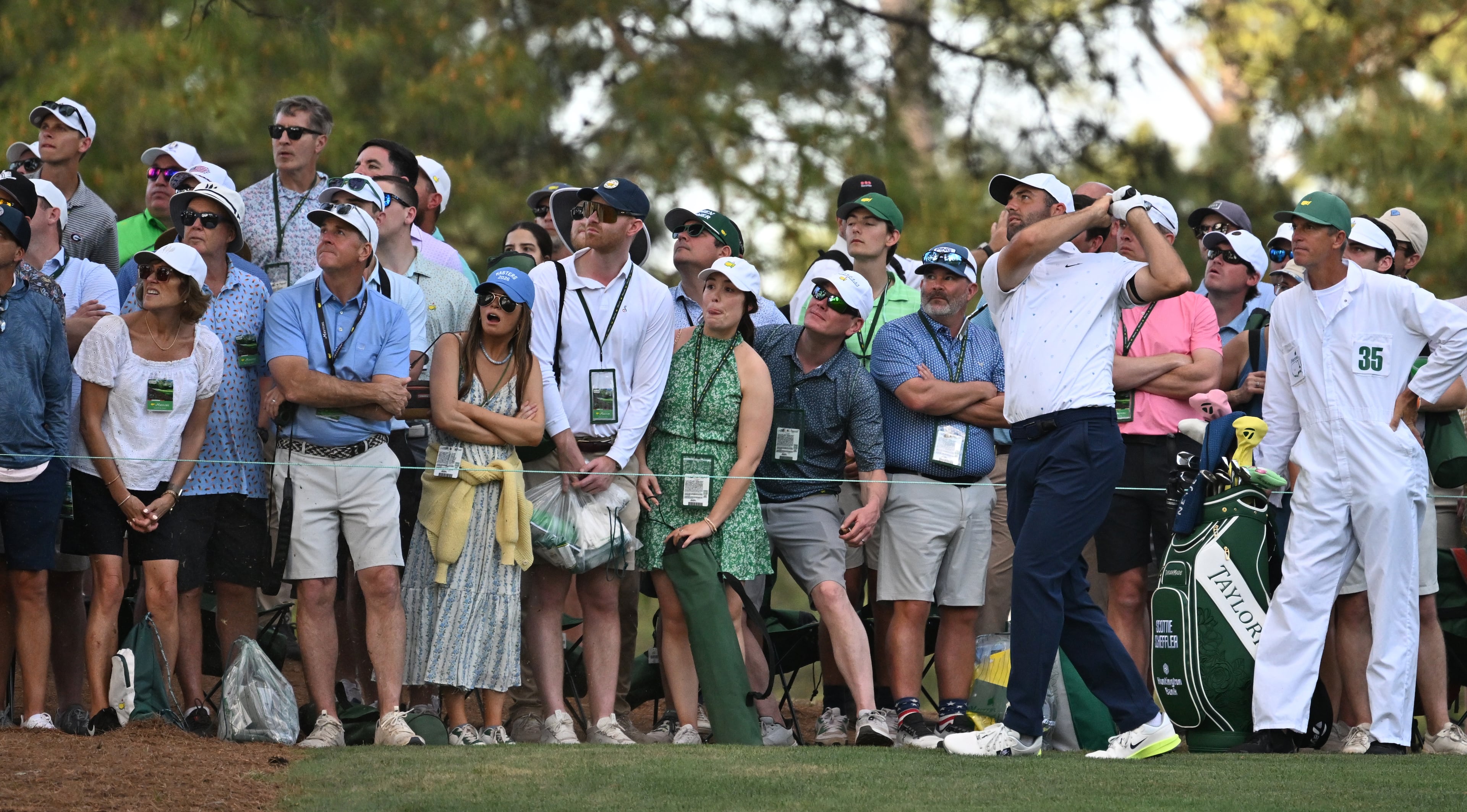 Scottie Scheffler hits from 15th fairway during final round of the Masters, at Augusta National Golf Club, Sunday, April 12, 2026, in Augusta, GA (Hyosub Shin/AJC)