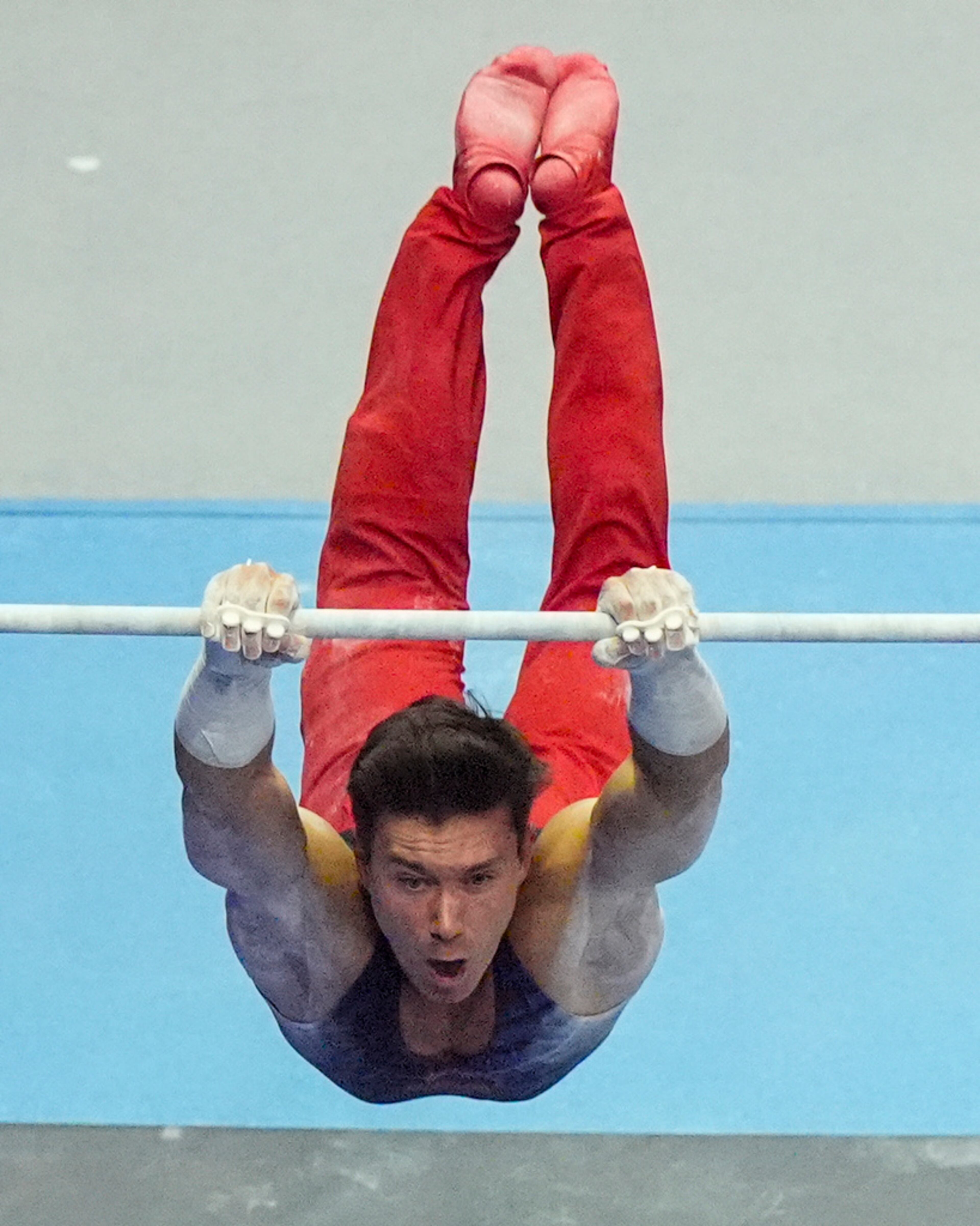 Brody Malone competes on the horizontal bar at the United States Gymnastics Olympic Trials on Thursday, June 27, 2024 in Minneapolis. (AP Photo/Charlie Riedel)