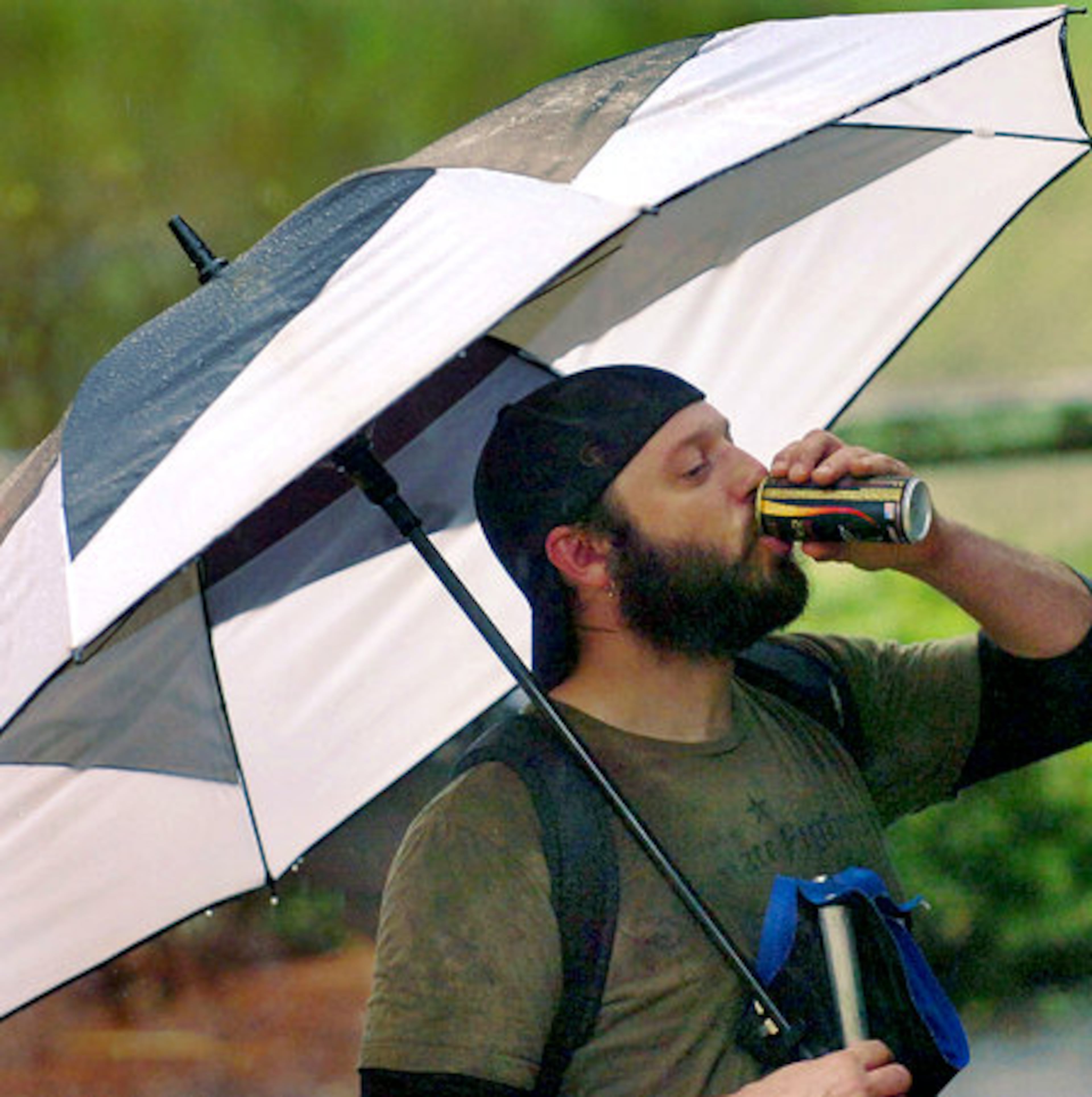 David Gaddis, 34, from Decatur, takes a big swig of an energy drink just before play begins.
