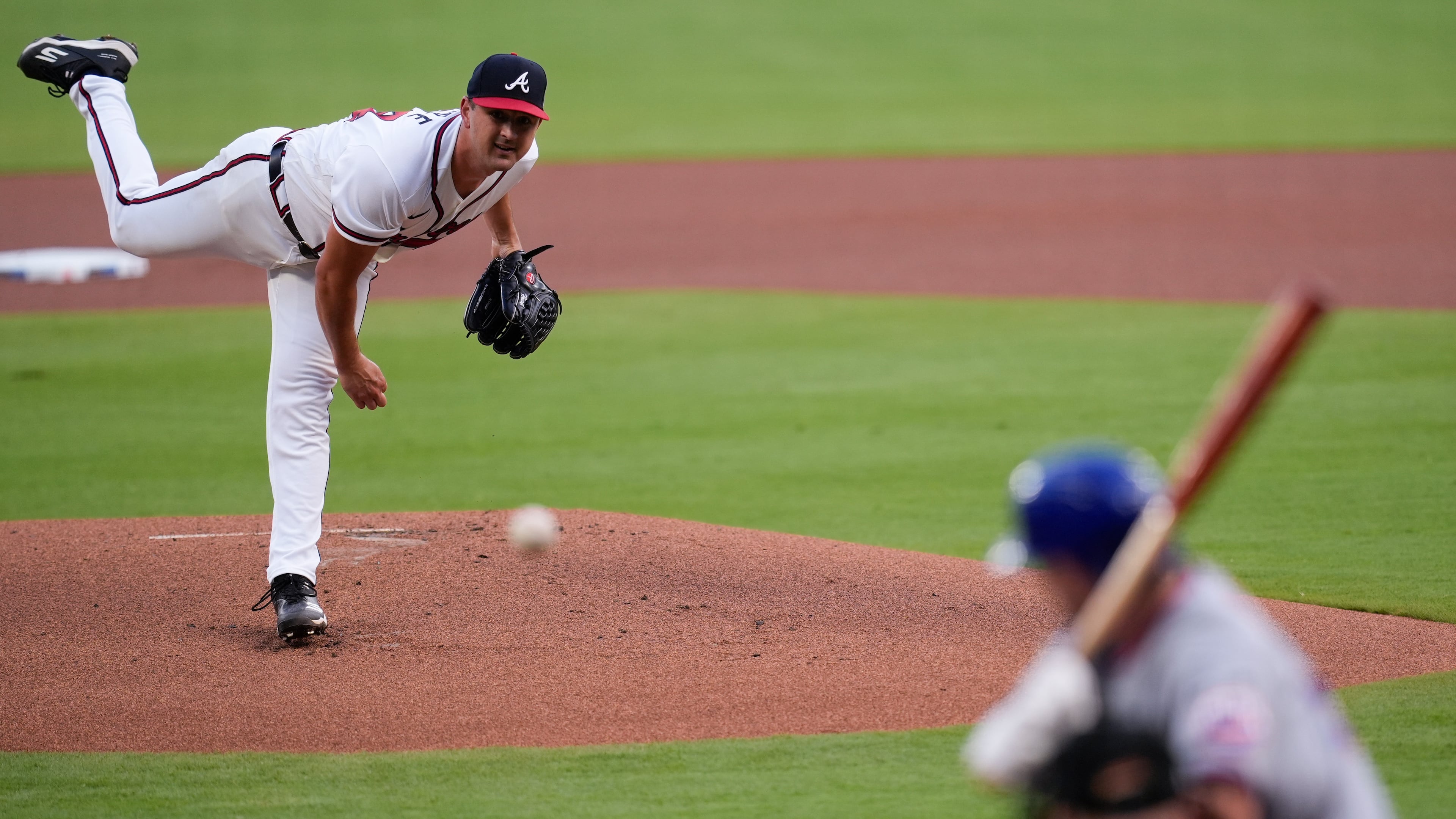 Atlanta Braves pitcher Tyler Mahle (54) delivers to New York Mets' A.J. Ewing in the first inning of a baseball game, Wednesday, Aug. 12, 2026, in Atlanta. (AP Photo/Mike Stewart)