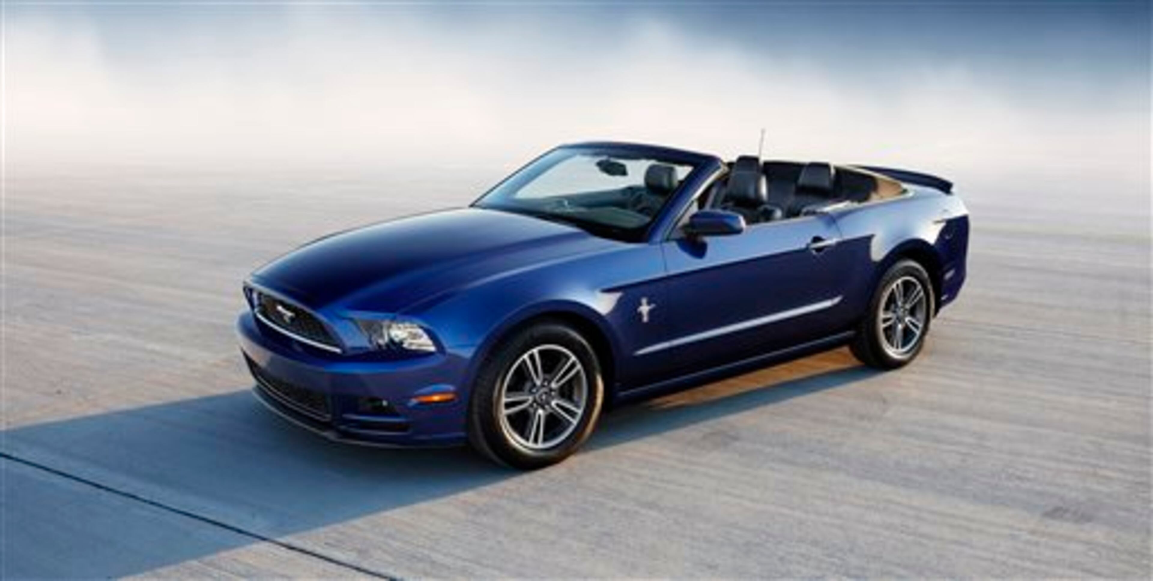 This image taken on July 1, 2013 provided by Ford shows a 2014 Ford Mustang. The Ford Mustang begins its 50th year of continuous production with more style choices and new colors, in addition to segment-leading technology and driver tools. A new version of the sports car is expected to go on sale in the spring. (AP Photo/Ford)