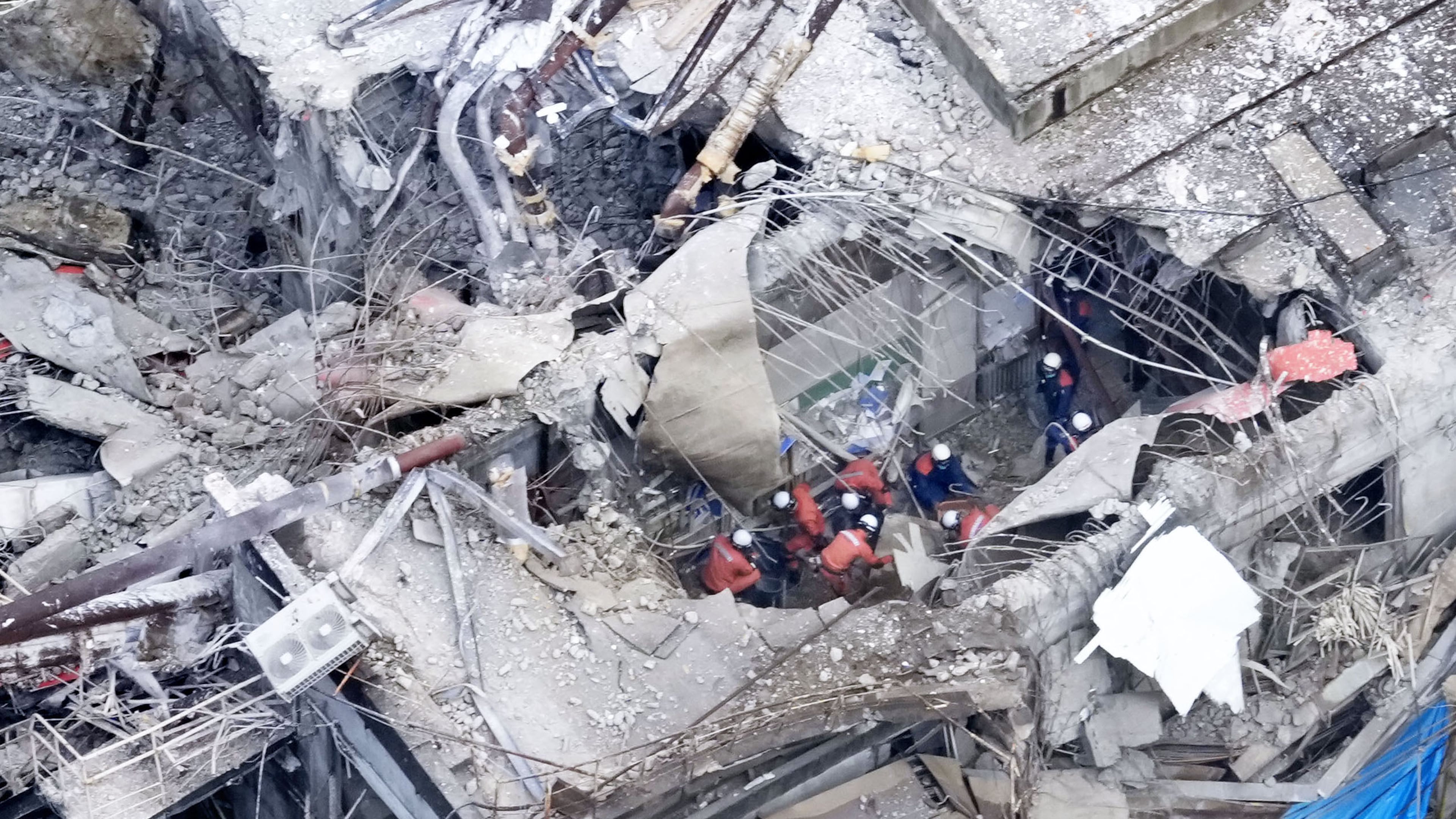 This aerial image shows rescue operation at the Nippon Paper Industries Co.’s Yatsushiro factory, following an earthquake in Yatsushiro, Kumamoto Prefecture, Wednesday, July 29, 2026. (Naoki Hiraoka/Kyodo News via AP)