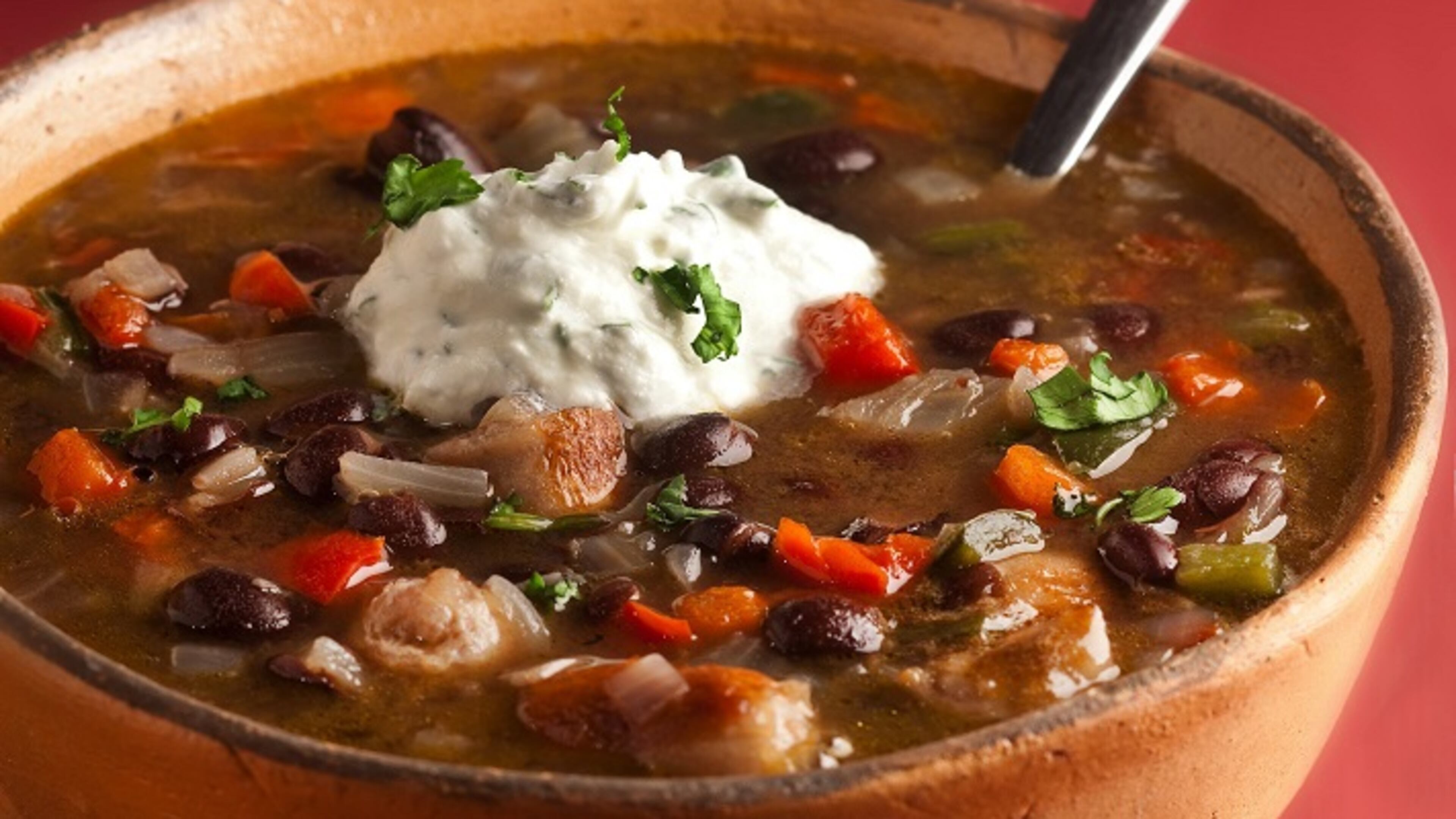 Black beans and Italian sausage form the base of a thick soup, backed up by red bell pepper for sweetness and poblano for some heat. (Bill Hogan/ Chicago Tribune/TNS)