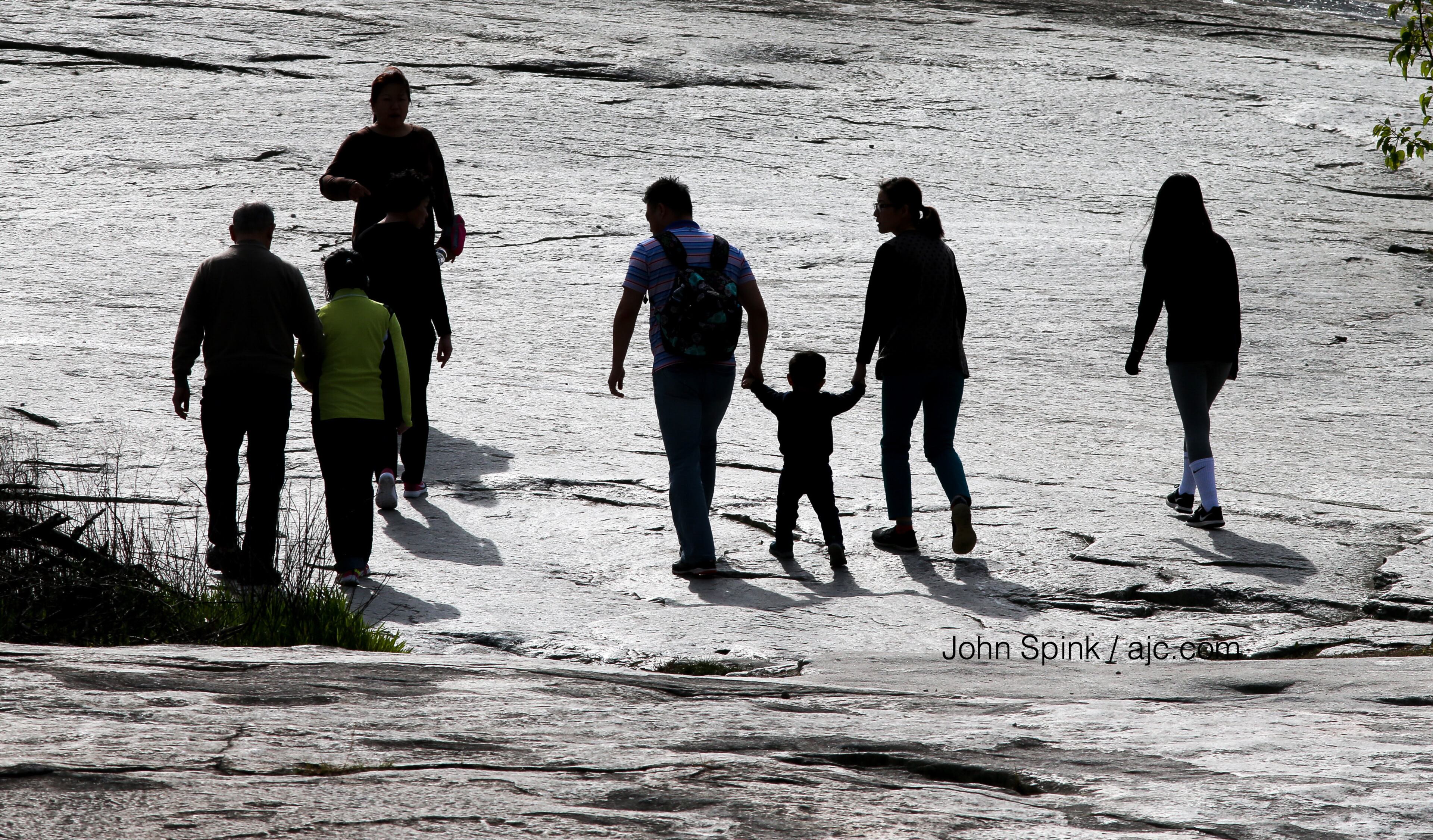 Visitors enjoy walking up Stone Mountain on a pleasant Wednesday morning. JOHN SPINK / JSPINK@AJC.COM