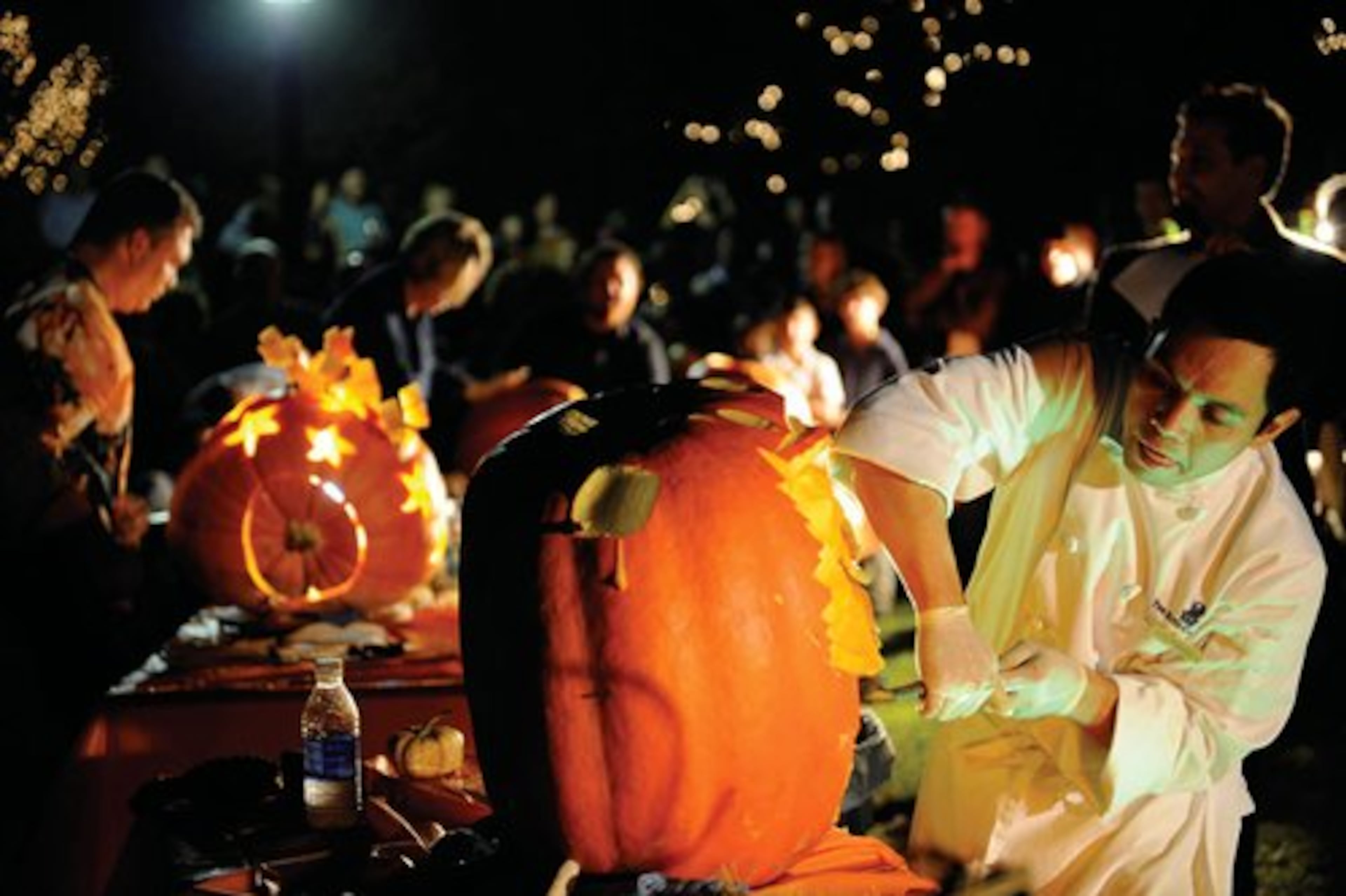 Ritz-Carlton Buckhead pastry chef Victor Dagatan carves away the last few bits during an audience countdown. The chefs are given 25 minutes to carve their masterpiece and the audience will vote by applause to determine the winner.