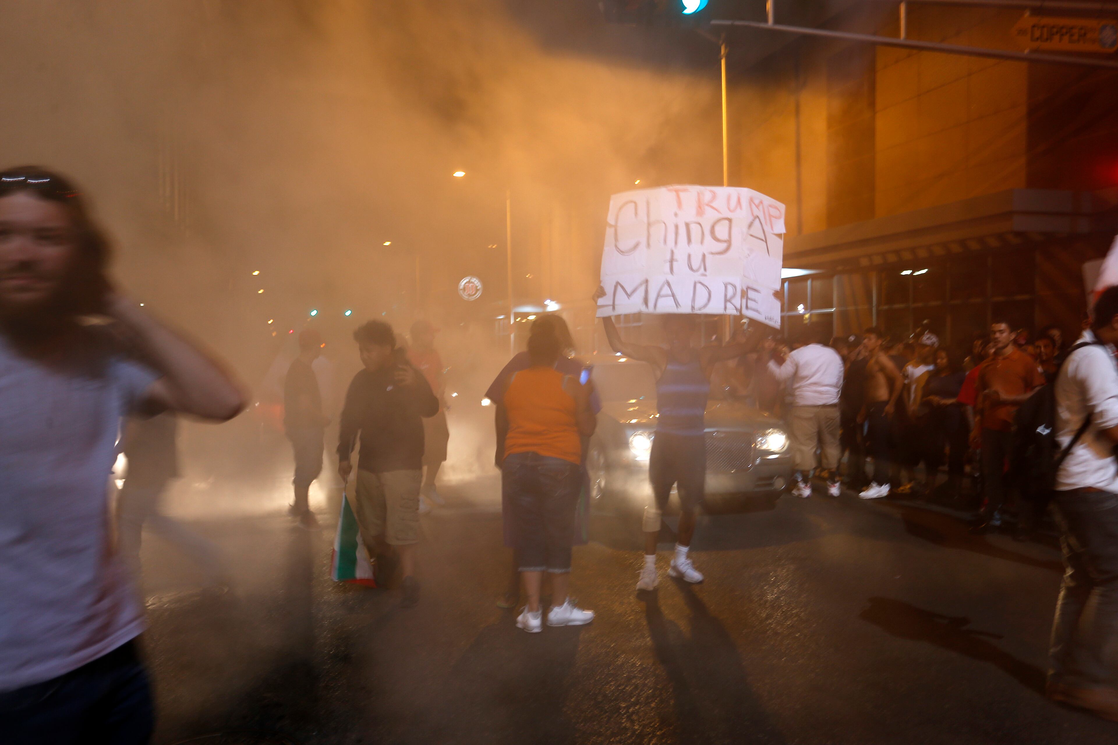 Anti-Trump protesters block the streets following a rally and speech by Republican presidential candidate Donald Trump at Albuquerque Convention Center where the event was held, in Albuquerque, N.M., Tuesday, May 24, 2016. (AP Photo/Brennan Linsley)