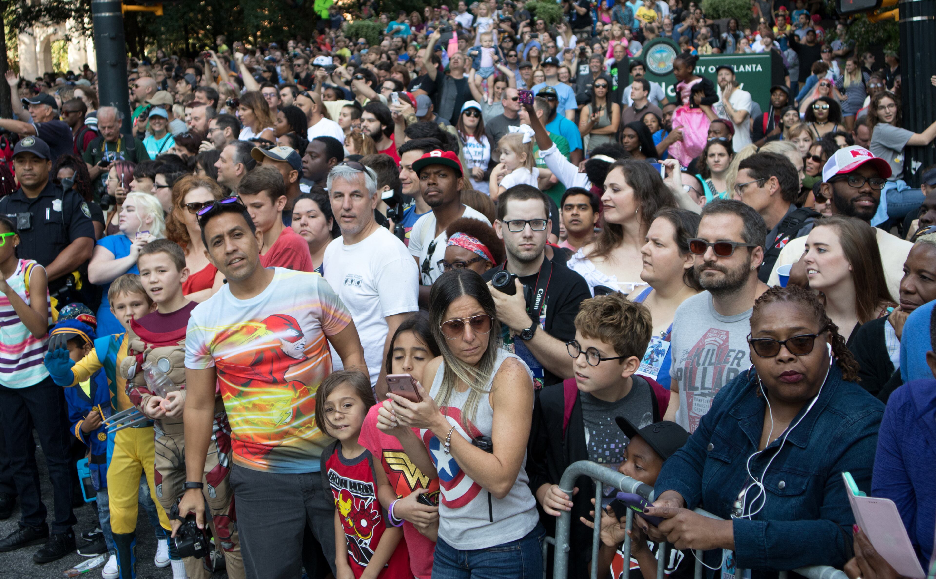 Large crowds gather along Peachtree Street Saturday to watch the Dragon Con parade in Atlanta GA September 2, 2017. STEVE SCHAEFER / SPECIAL TO THE AJC