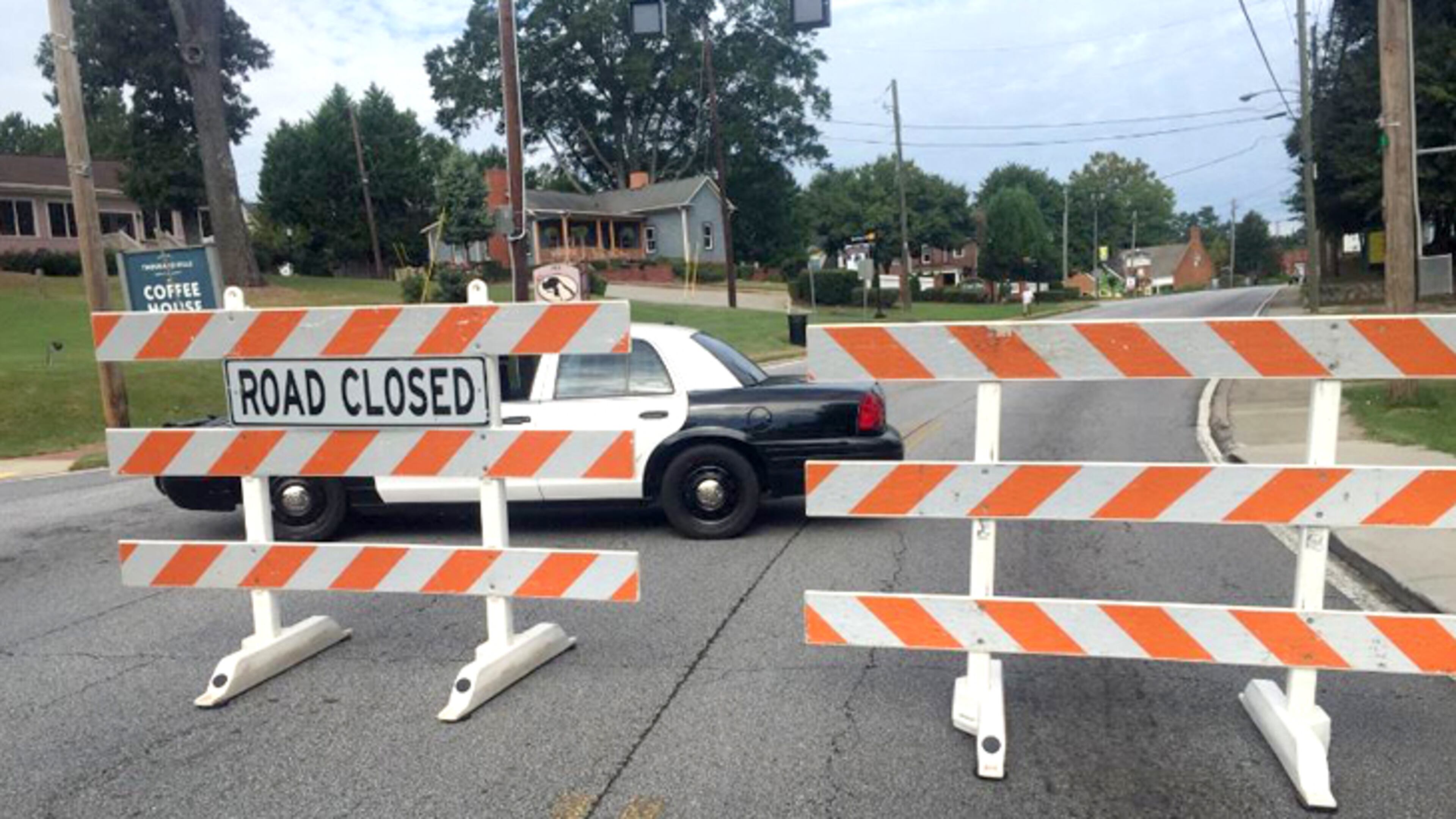A section of Woodstock Road near Woodstock will be closed for two weeks starting Tuesday. AJC FILE
