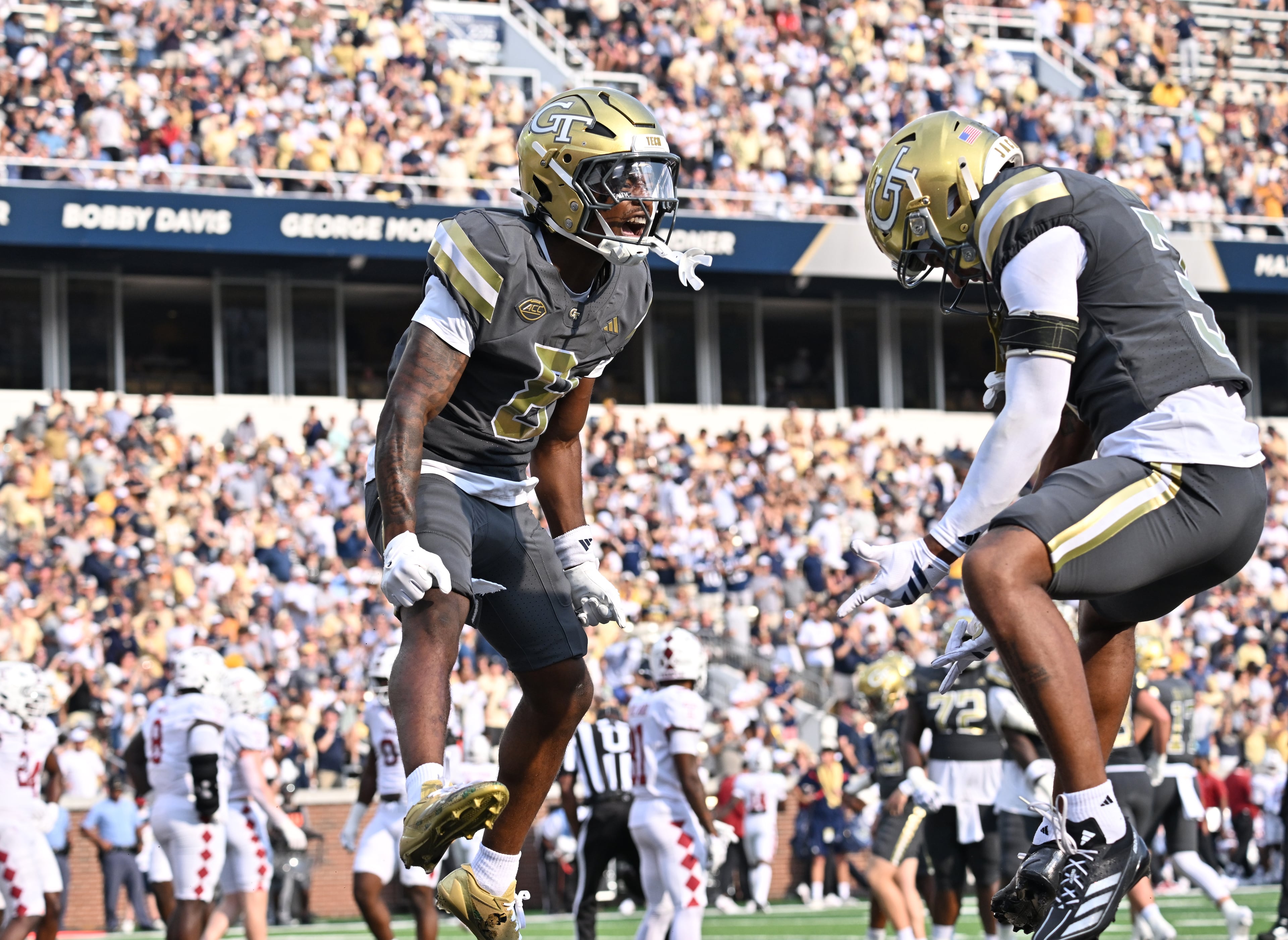 Georgia Tech wide receiver Malik Rutherford celebrates with teammates after scoring a touchdown during the first half against Temple at Bobby Dodd Stadium on Saturday, Sept. 20, 2025, in Atlanta. (Hyosub Shin/AJC)