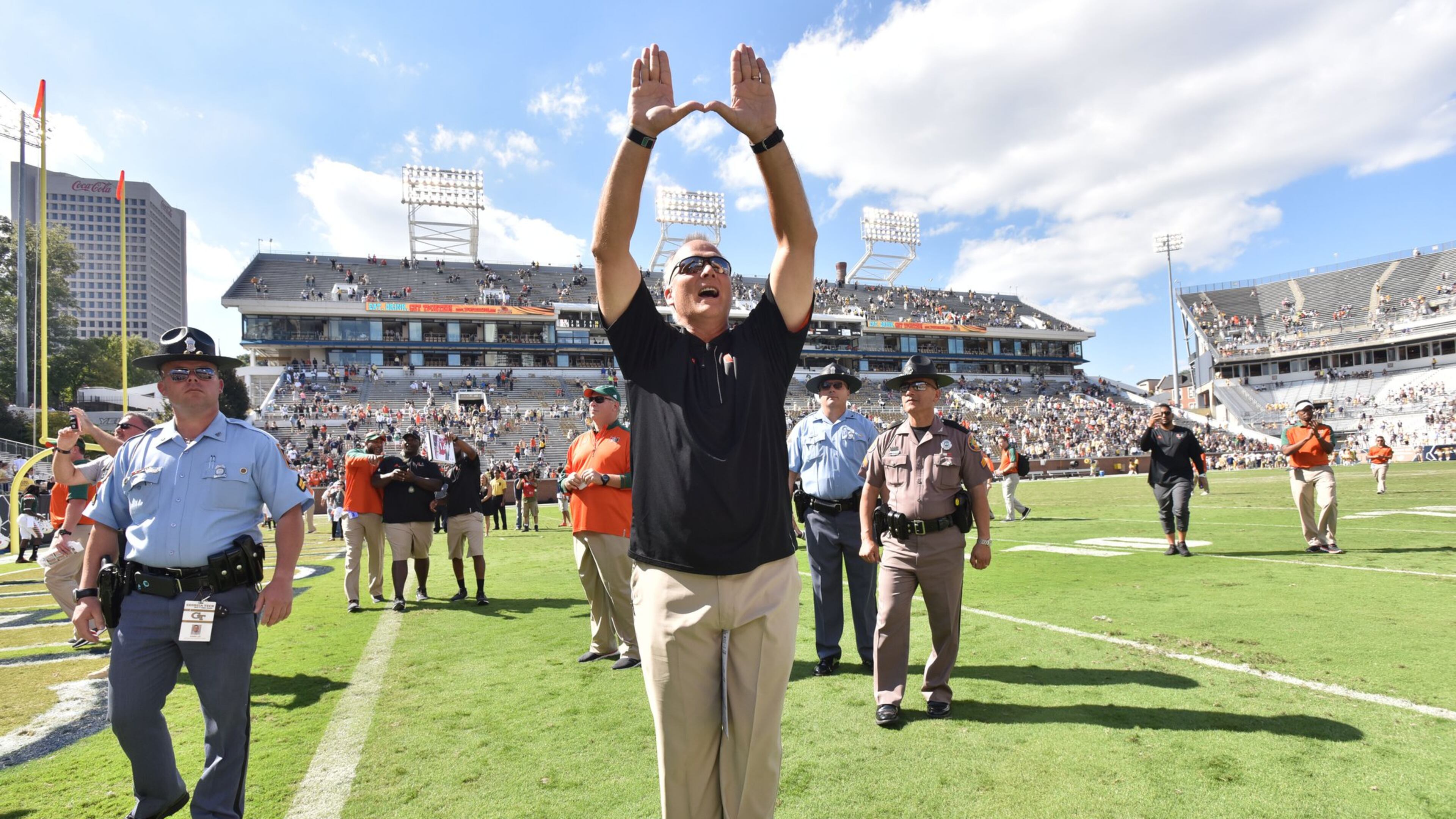 Miami Hurricanes coach Mark Richt celebrates after his team’s 35-21 win over Georgia Tech at Bobby Dodd Stadium on Oct. 1. (HYOSUB SHIN / HSHIN@AJC.COM)