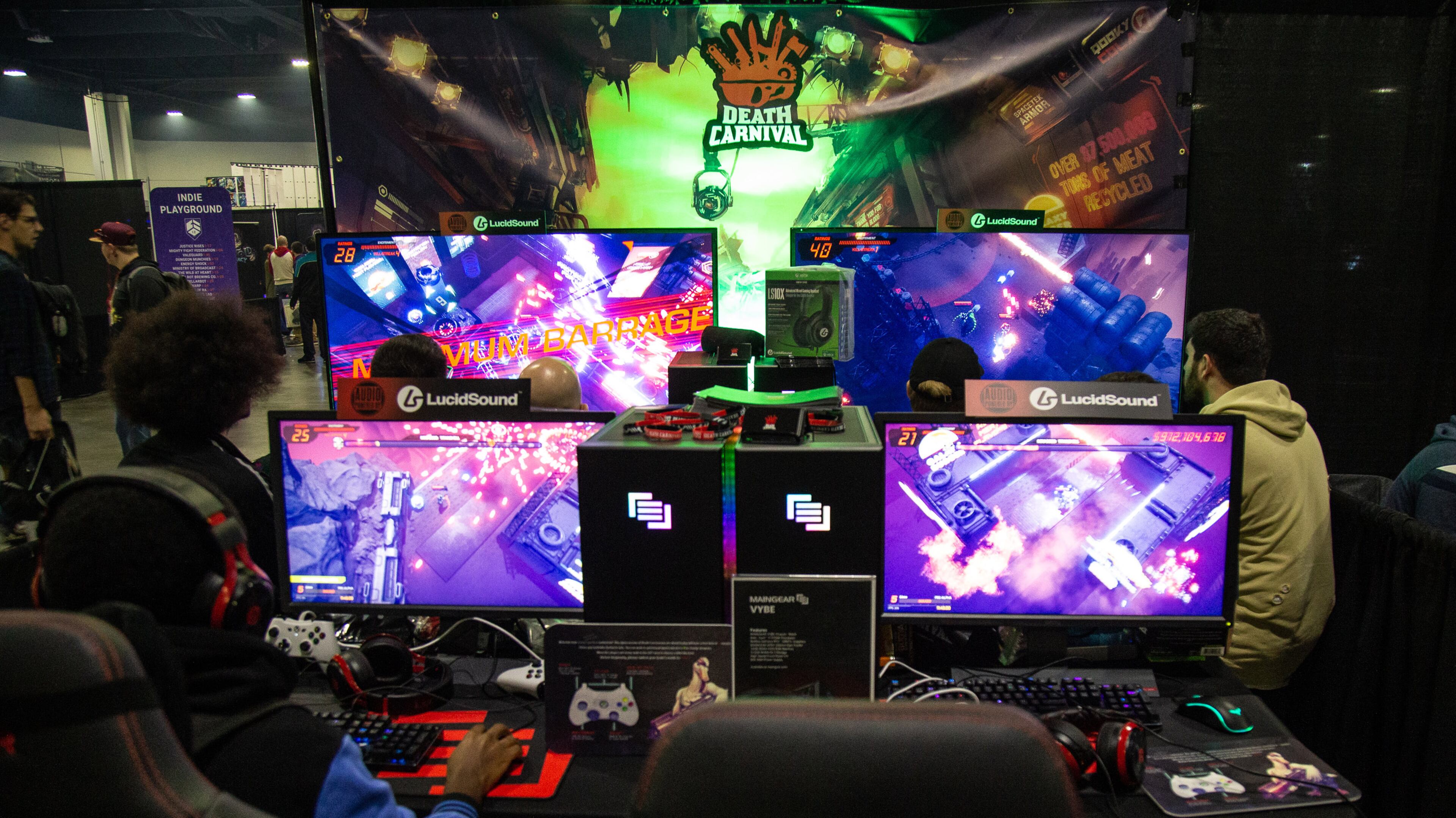 DreamHack attendees play Death Carnival, an arcade multiplayer shooter game, at the Georgia World Congress Center in 2019. (Steve Schaefer /AJC File 2020)