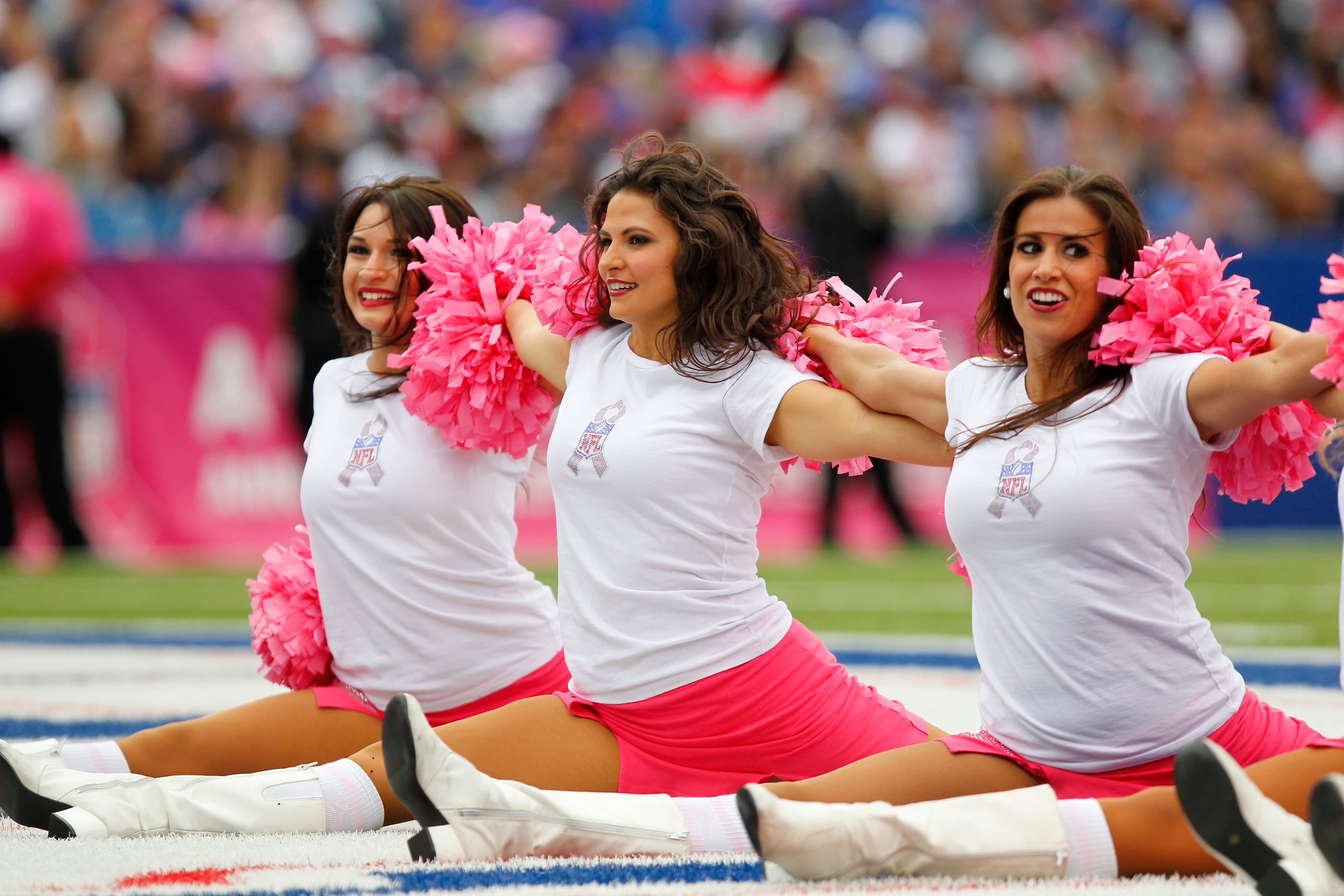 Buffalo Bills cheerleaders perform wearing Breast Cancer Awareness outfits during an NFL football game against the Cincinnati Bengals on Sunday, Oct. 13, 2013, in Orchard Park, N.Y. (AP Photo/Bill Wippert)
