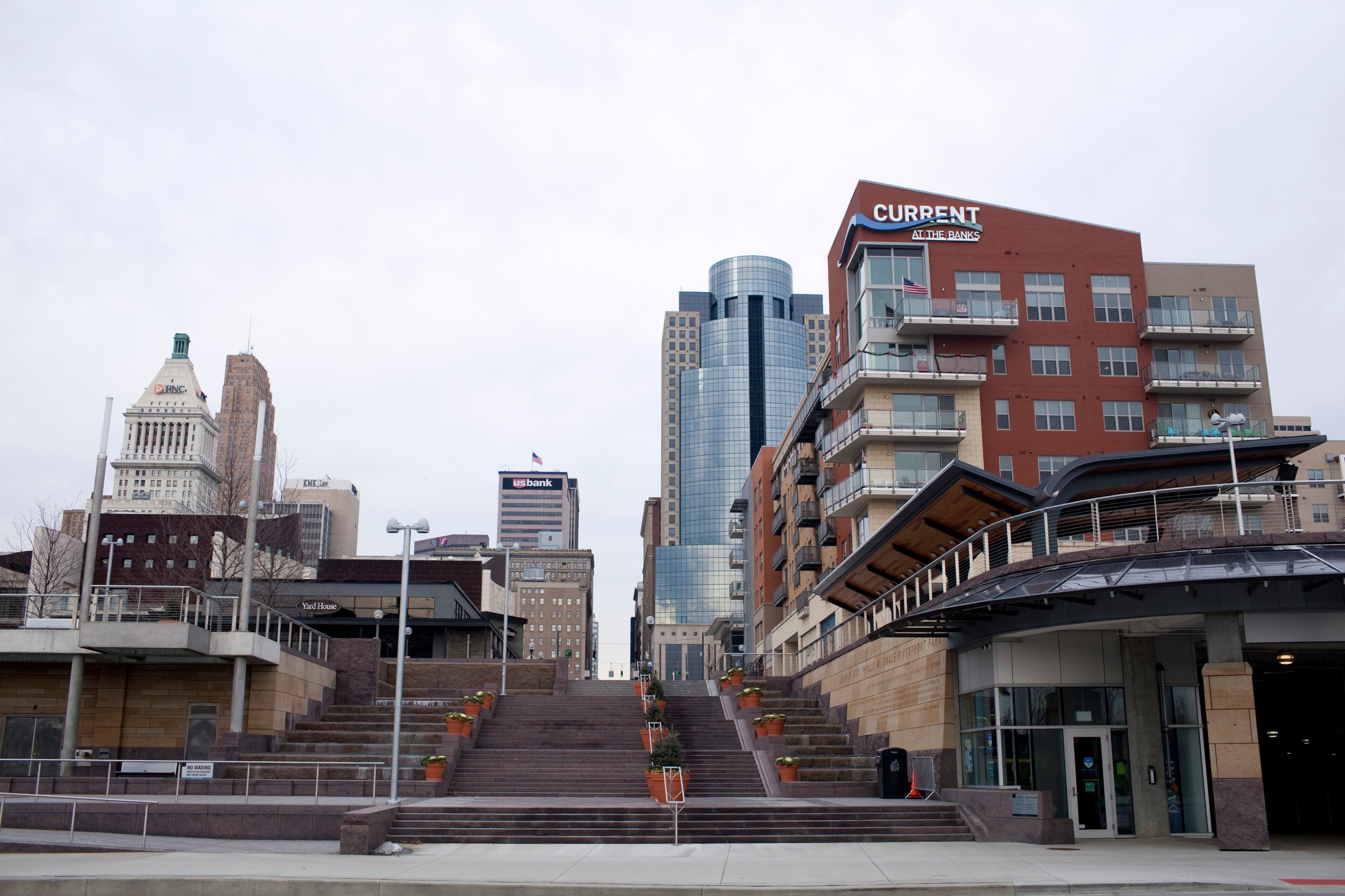 The Banks is in the heart of the Riverfront development in Cincinnati, Ohio and combines entertainment and residency at a convenient location between two professional sports teams stadiums: Paul Brown Stadium and Great American Ball Park. Plans to develop the area have been in the works for over a decade and will continue for several more years to fully expand the area to include a carousel, green space, boat docks and playgrounds. People are drawn to the area to attend Red's baseball games, tailgate before Bengals football games and concerts in the parks. There are several restaurants and bars in the area including Toby Keith's I love this Bar & Grill, Johnny Rockets, Ruth's Chris Steakhouse and Orange Leaf.