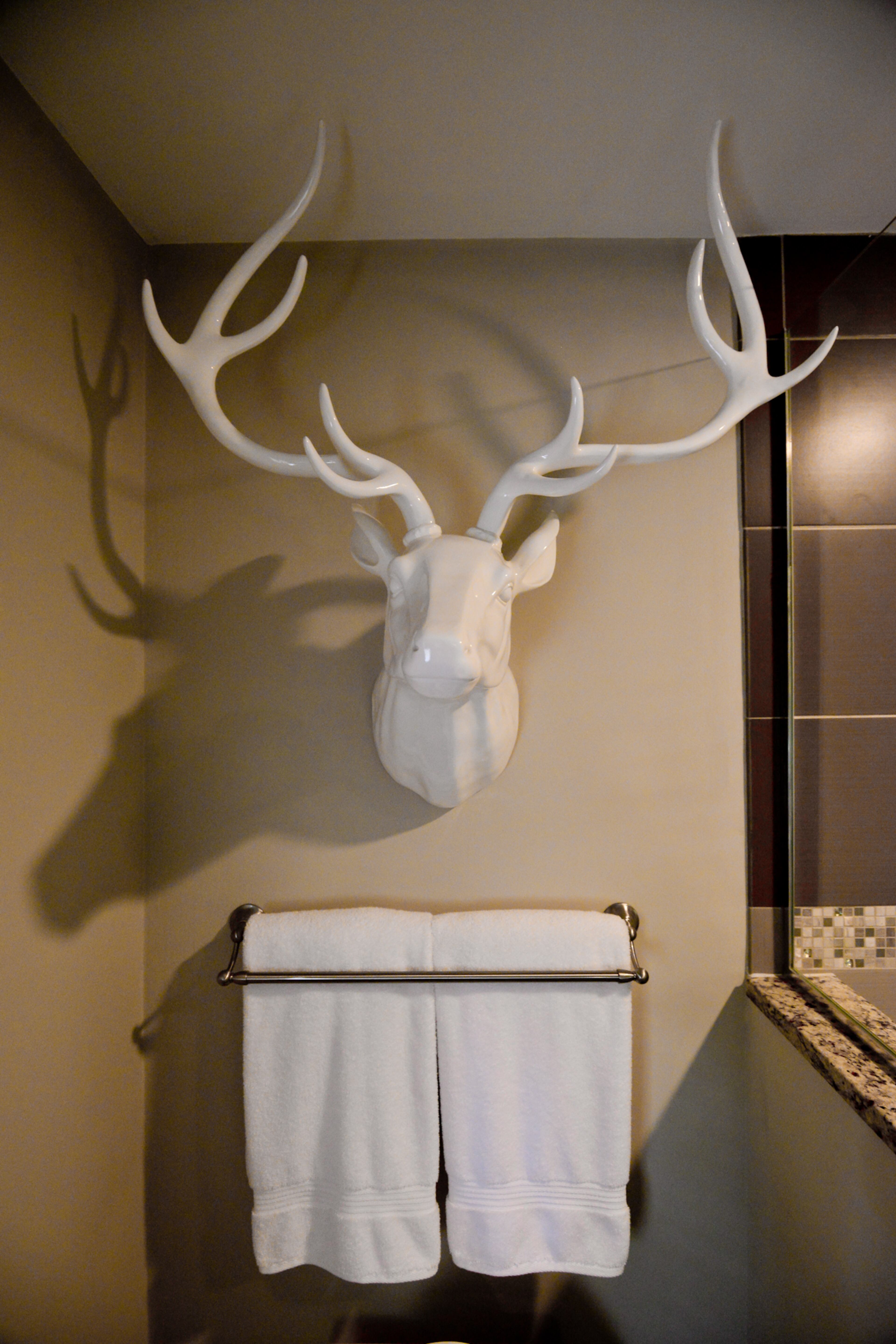 The deer head connects with Betsy Clay's upbringing."I am originally from south Georgia and used to hunt. I saw that piece in an art gallery in Atlanta and just fell in love with it. It was such a whimsical nod to being from south Georgia and hunting."