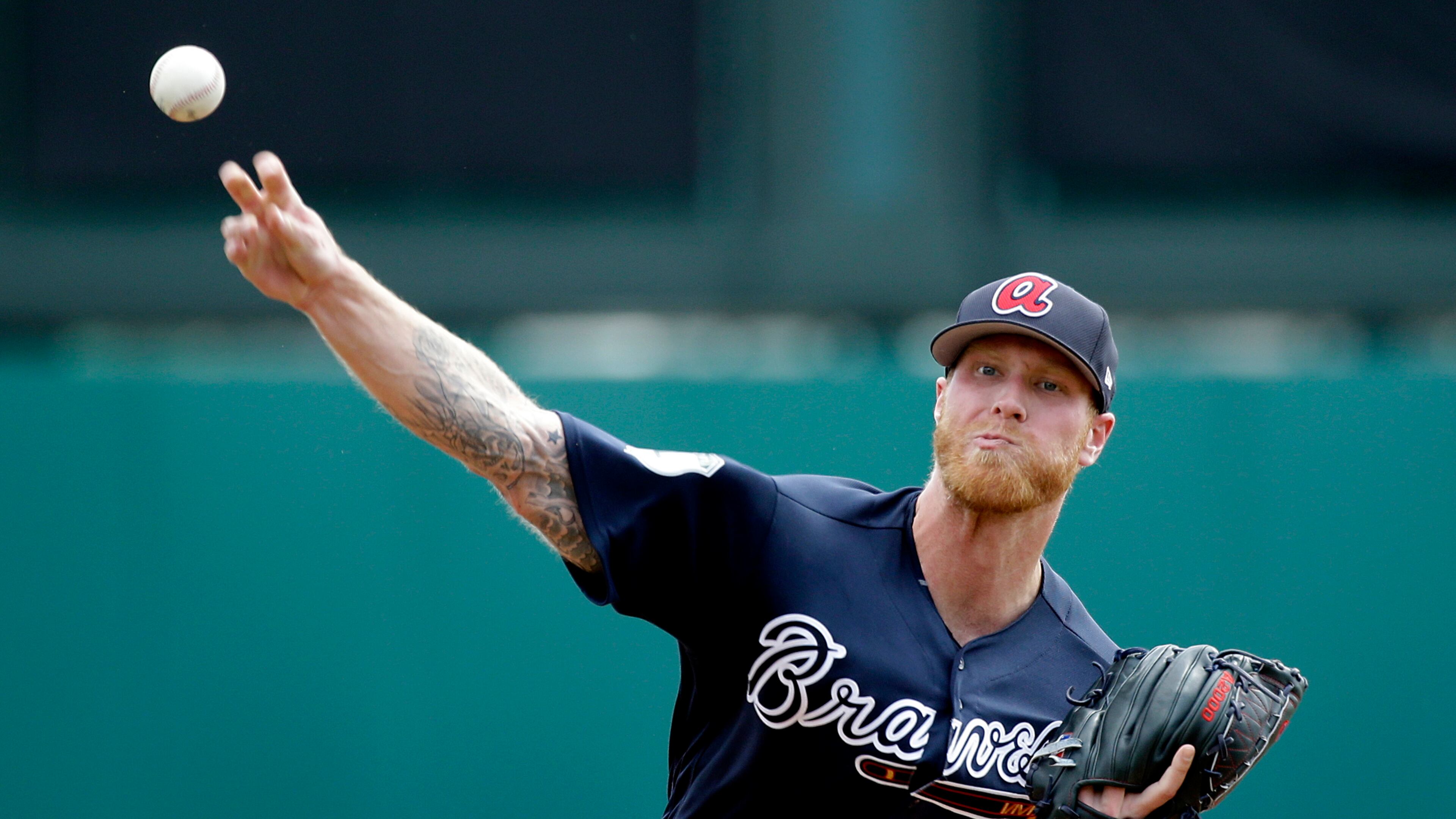 Braves starting pitcher Mike Foltynewicz (26) throws against the St. Louis Cardinals in a spring training baseball game, Tuesday, Feb. 28, 2017, in Kissimmee, Fla. (AP Photo/John Raoux)