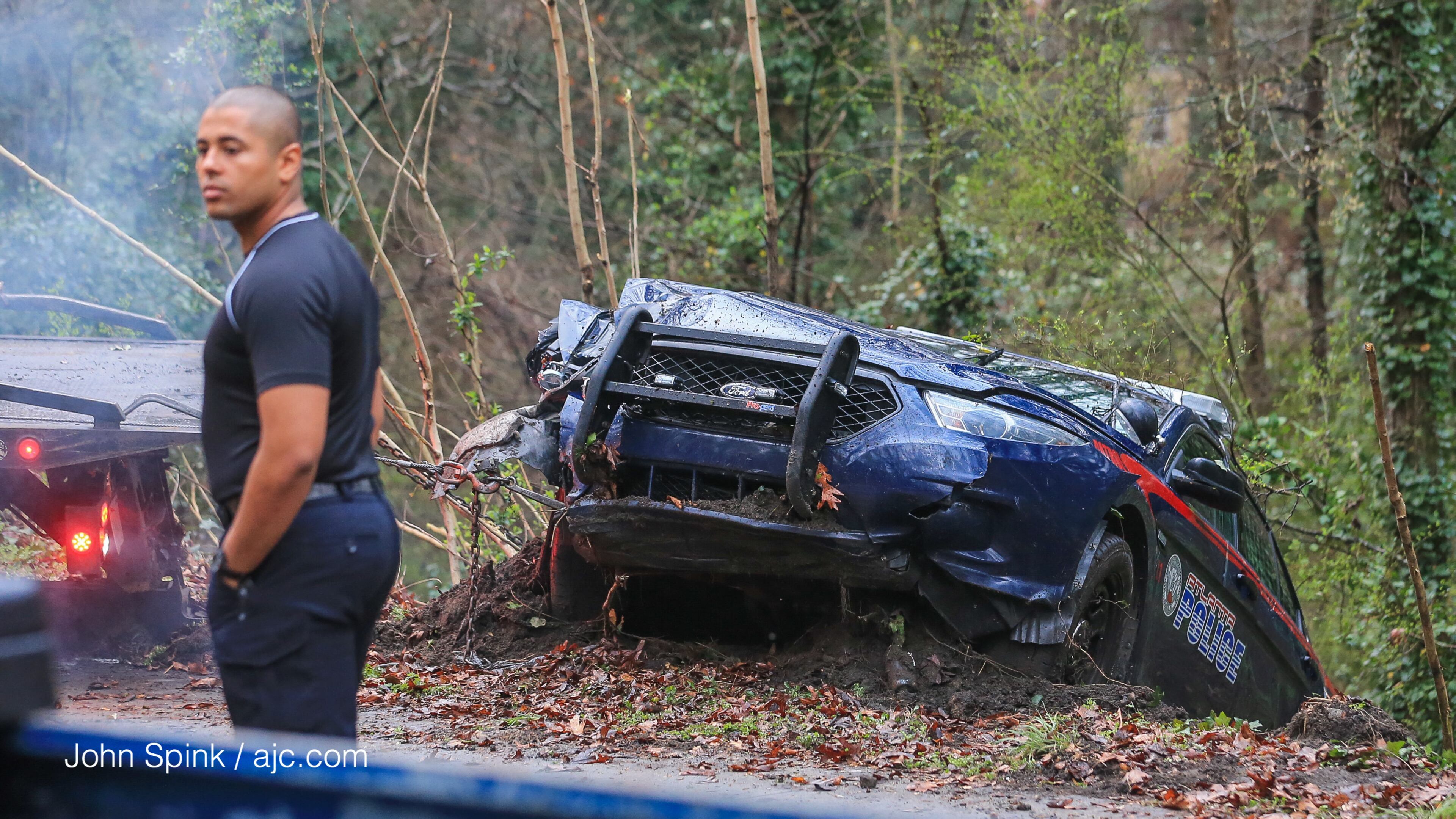 An Atlanta police officer is OK after his patrol car crashed into a power pole on Joseph E. Boone Boulevard. The accident knocked out power to more than 1,000 people early Wednesday.