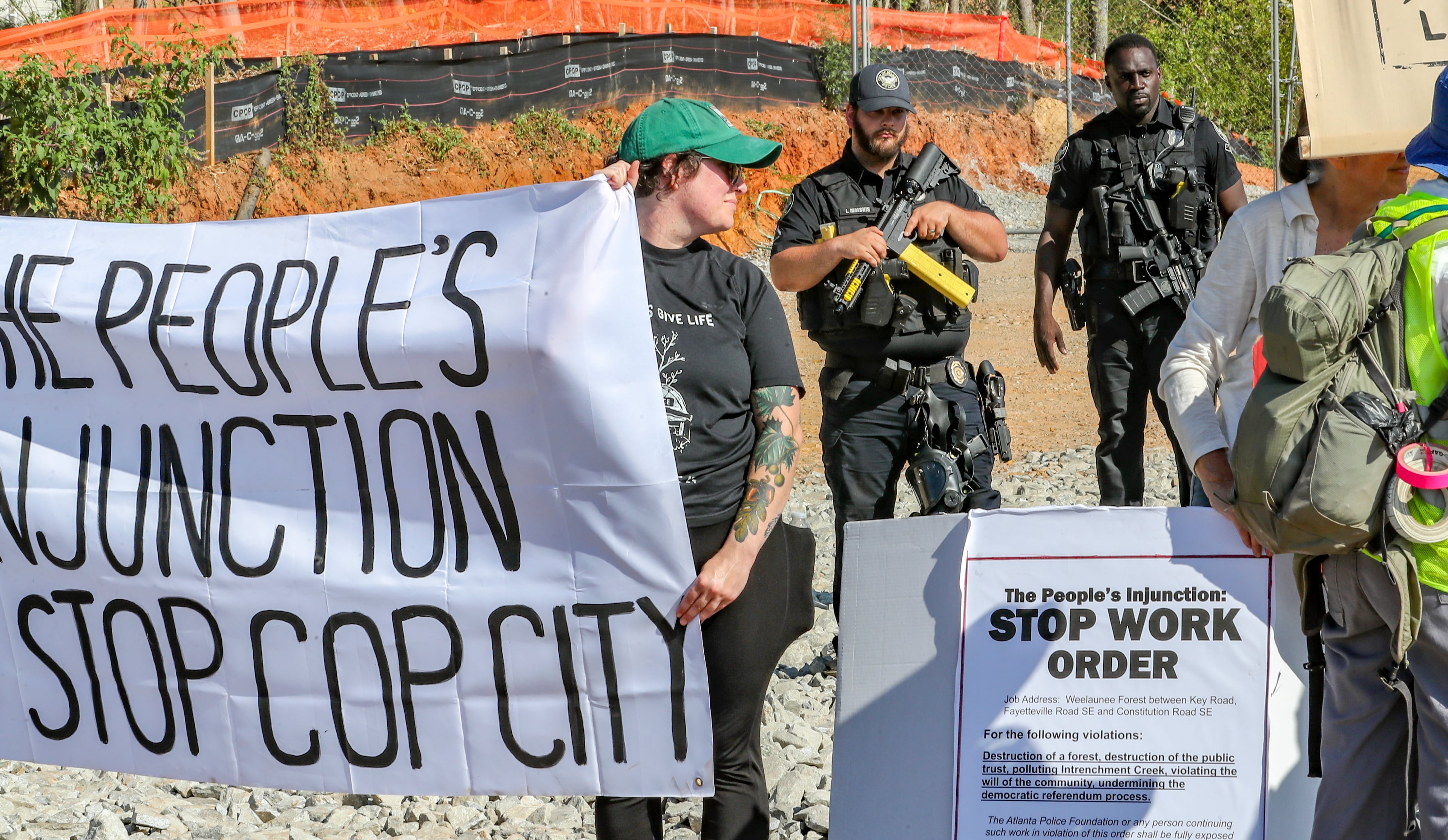 Protesters gathered on Constitution Road after five people were arrested at the site of the Atlanta Public Safety Training Center on Sept. 7, 2023. (John Spink/AJC file photo)