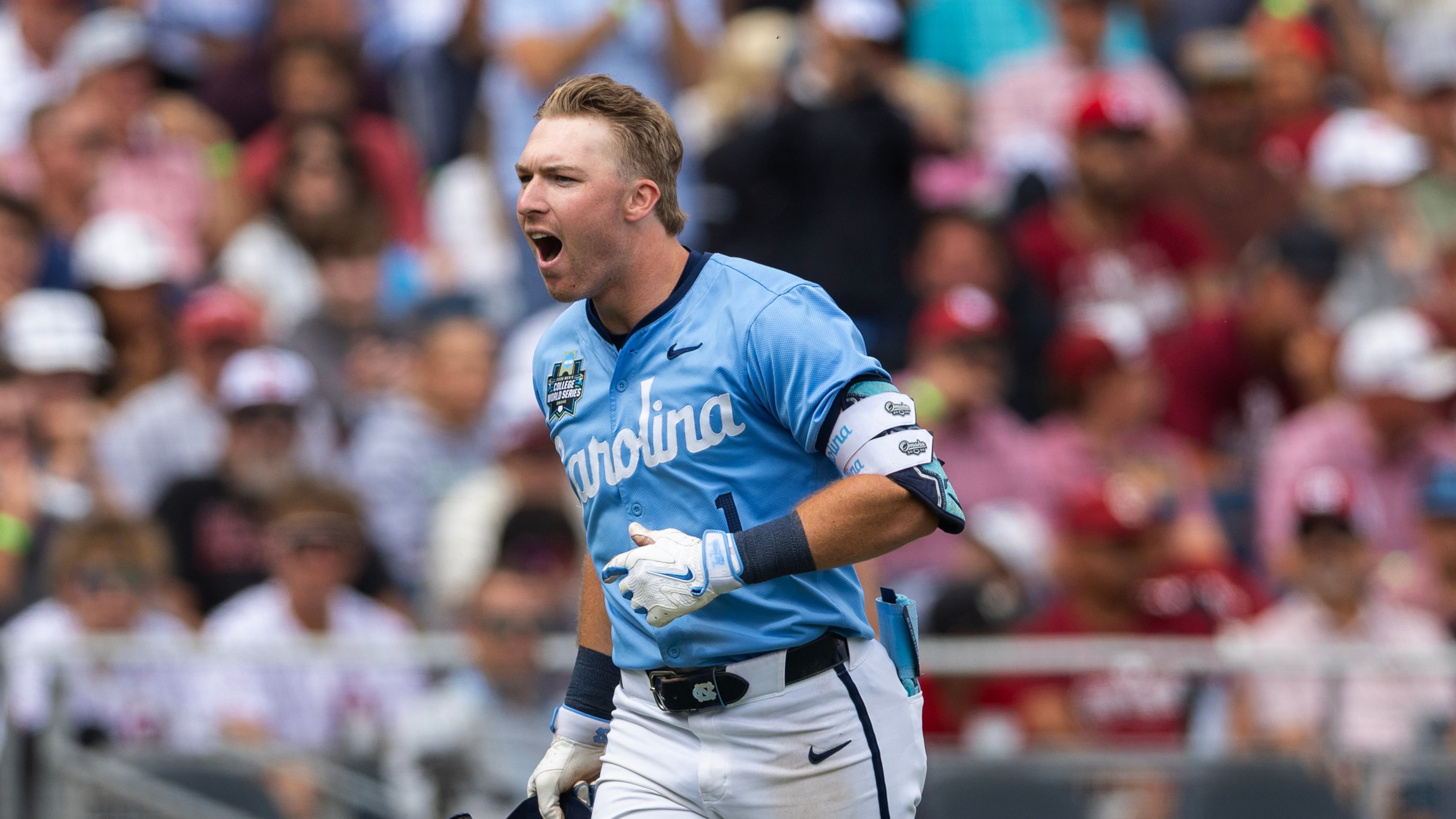 North Carolina's Cooper Nicholson celebrates after hitting a two-run home run against Oklahoma in the seventh inning of Game 2 of the NCAA College World Series baseball finals in Omaha, Neb., Sunday, June 21, 2026. (AP Photo/Rebecca S. Gratz)
