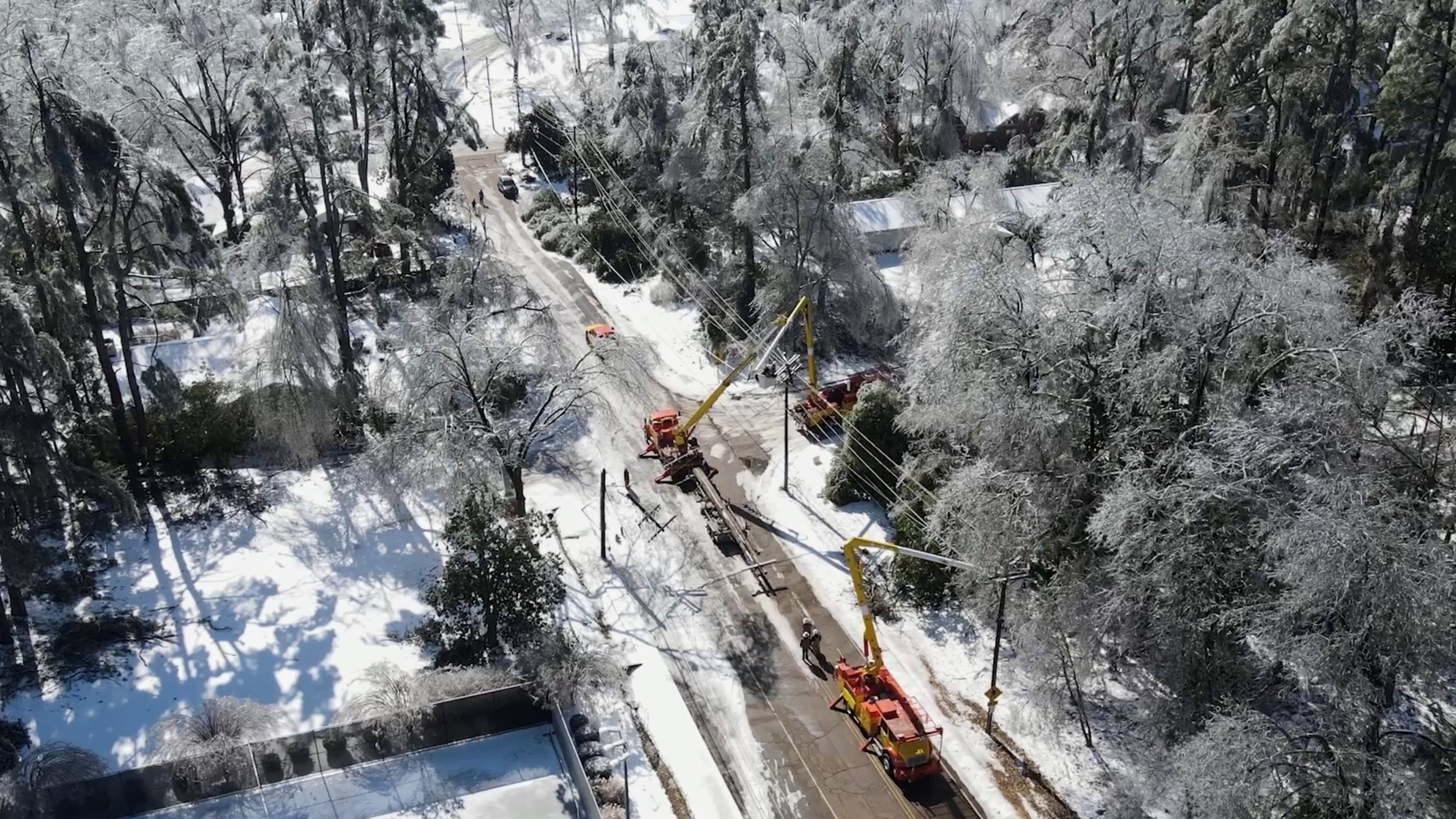 This image taken from a video released by the city of Oxford, Miss., shows crews working on power lines Tuesday, Jan. 27, 2026. (City of Oxford Mississippi via AP)