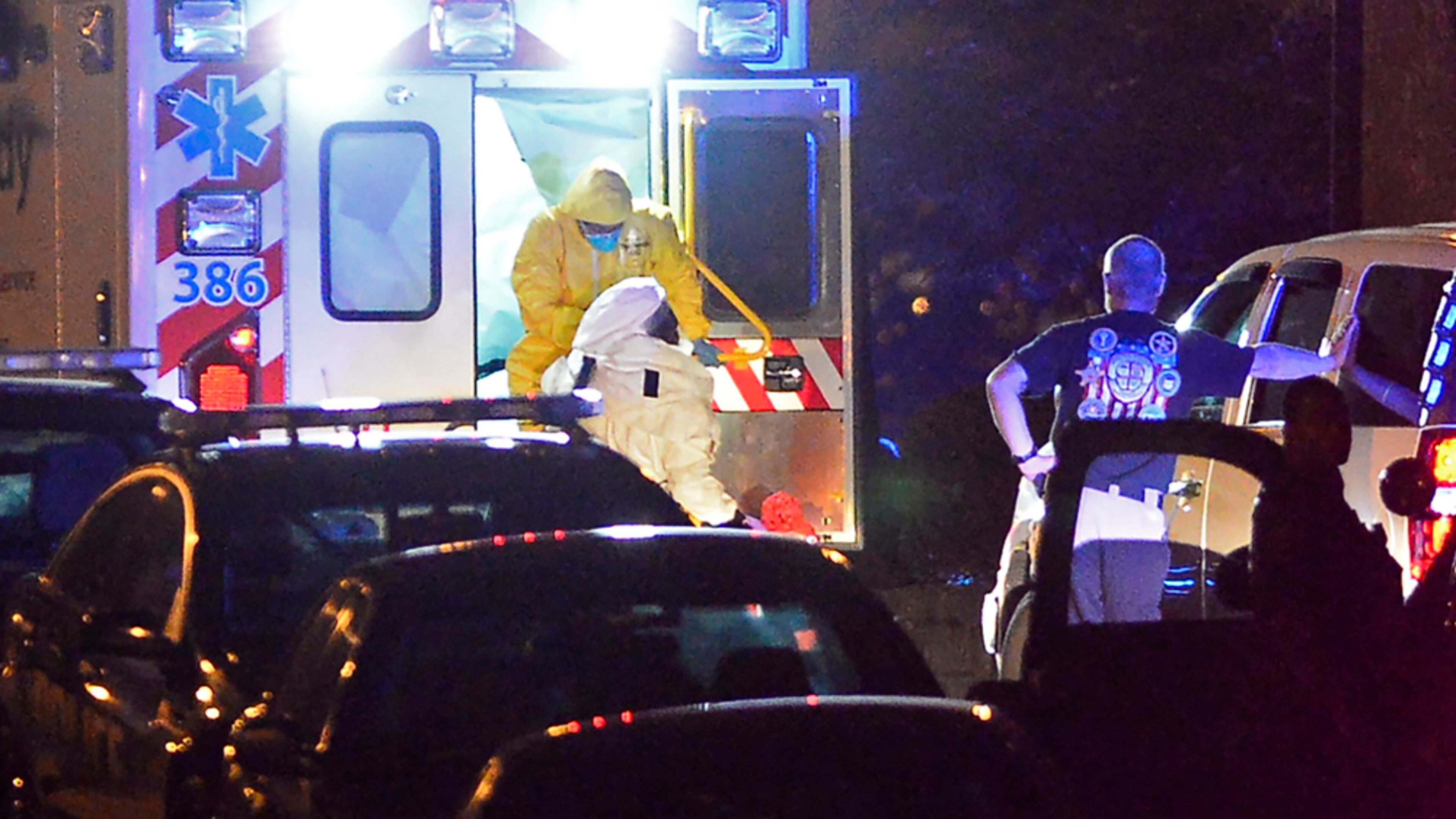 DALLAS EBOLA PATIENT ARRIVES IN ATLANTA--An ambulance carrying Amber Joy Vinson, the second health care worker to be diagnosed with Ebola in Texas, arrives at Emory University Hospital on Wednesday, Oct. 15, 2014, in Atlanta. Vinson was one of the nurses who cared for Thomas Eric Duncan, who died at the Dallas hospital last week of the Ebola virus. (AP Photo/David Tulis)